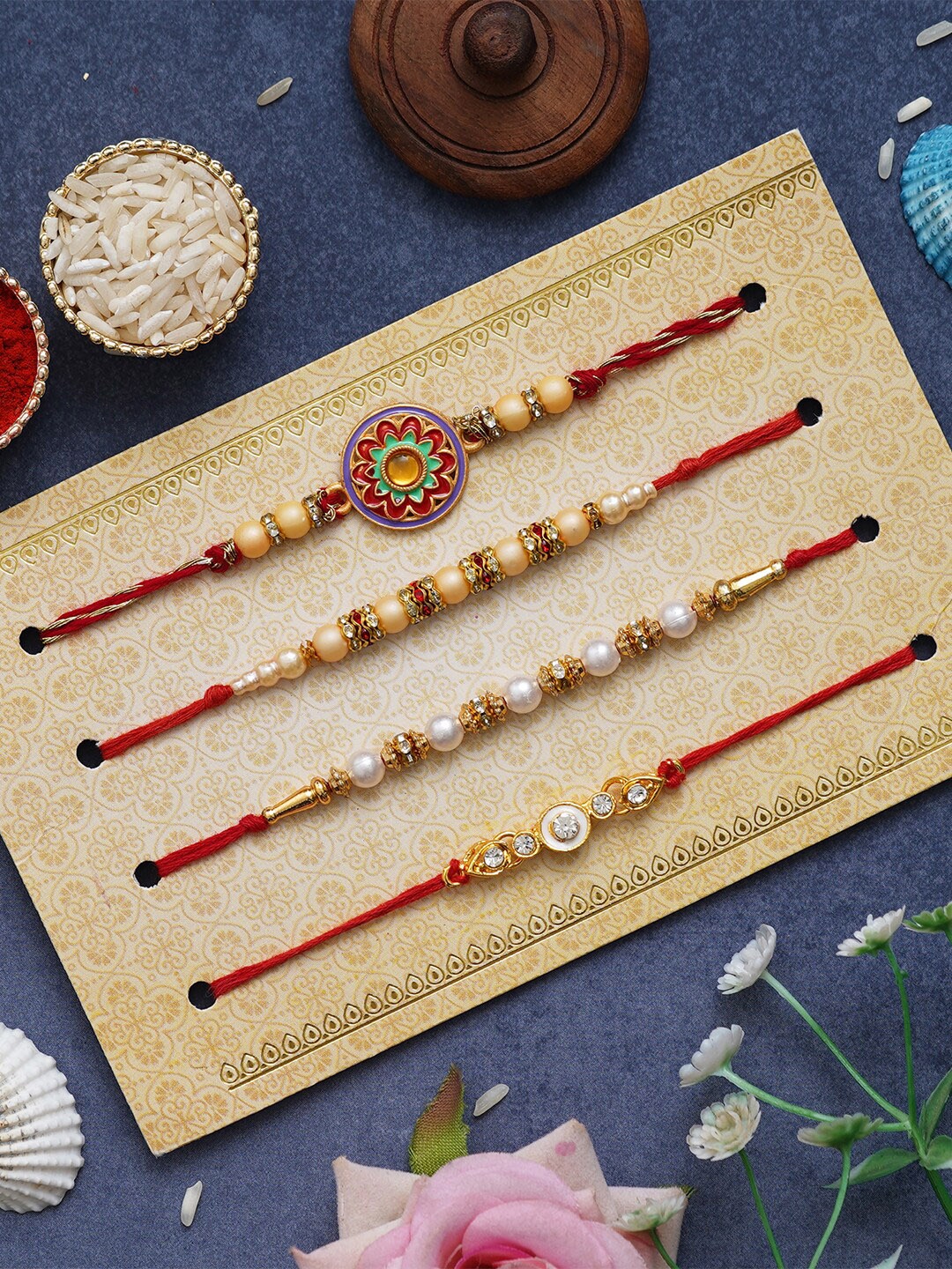 

eCraftIndia Set of 4 Rakhi With Roli Chawal & Ganesha Statue Greeting Card Gift Set, Red