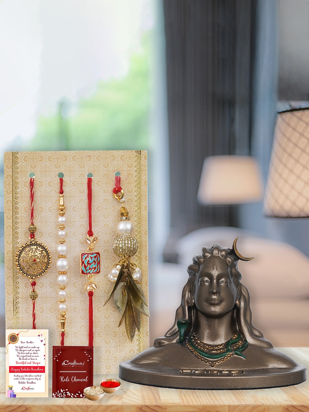 

eCraftIndia Set of 4 Beaded Rakhi with Roli Chawal Greeting Card & Adiyogi Shiva Statue, Gold