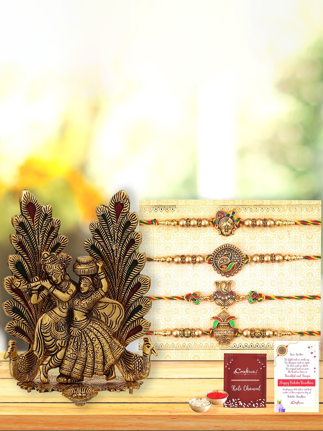 

eCraftIndia Set of 4 Rakhi with Roli Chawal & Radha Krishna Idol Greeting Card Gift Set, Gold