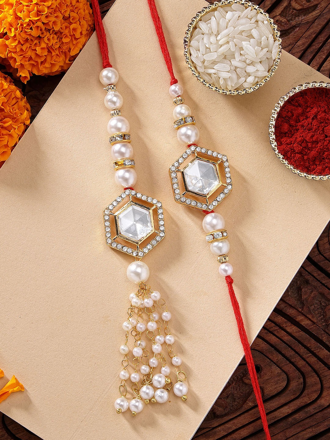 

KARATCART 2pcs Gold-Plated Artificial Beads & Polki Kundan Rakhi Combo with Roli & Chawal