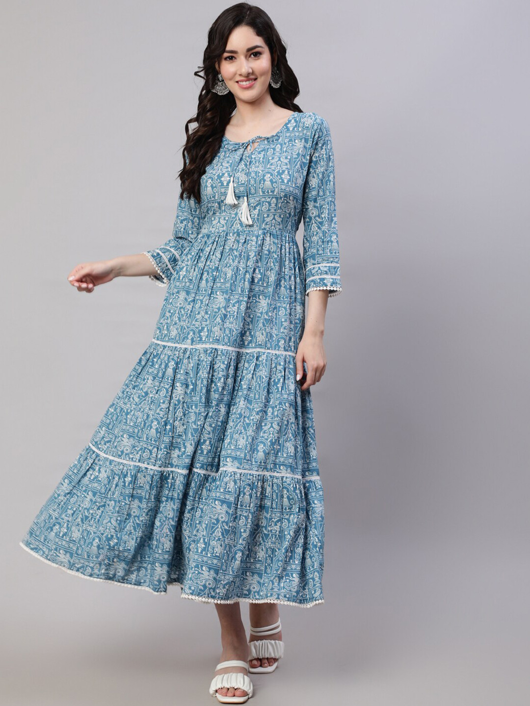 

Nayo Blue Ethnic Motif Printed Tiered Tie-Up Neck Midi Cotton Fit & Flare Ethnic Dress