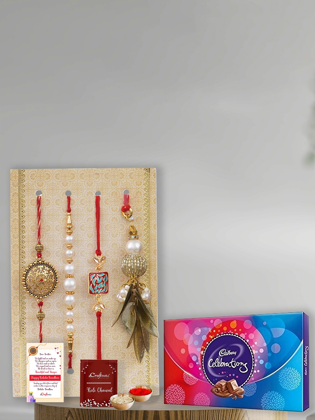 

eCraftIndia Set of 4 Designer Rakhi with Cadbury Celebrations, Multi