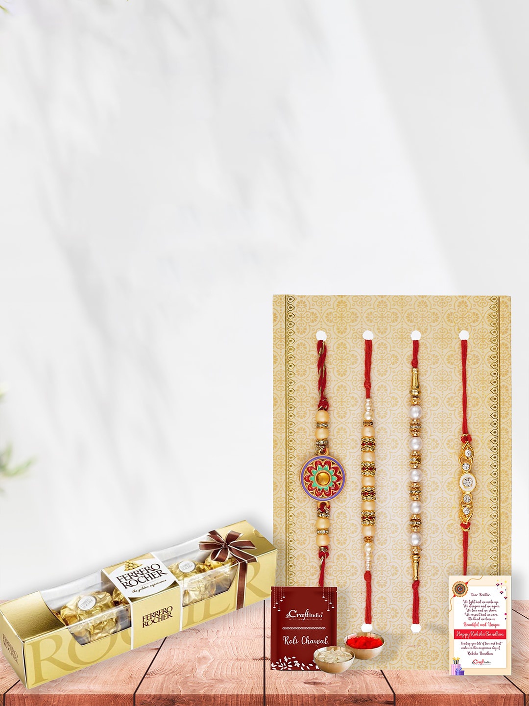 

eCraftIndia Set of 4 Designer Rakhi With Roli Chawal Greeting Card & Ferrero Rocher, Multi
