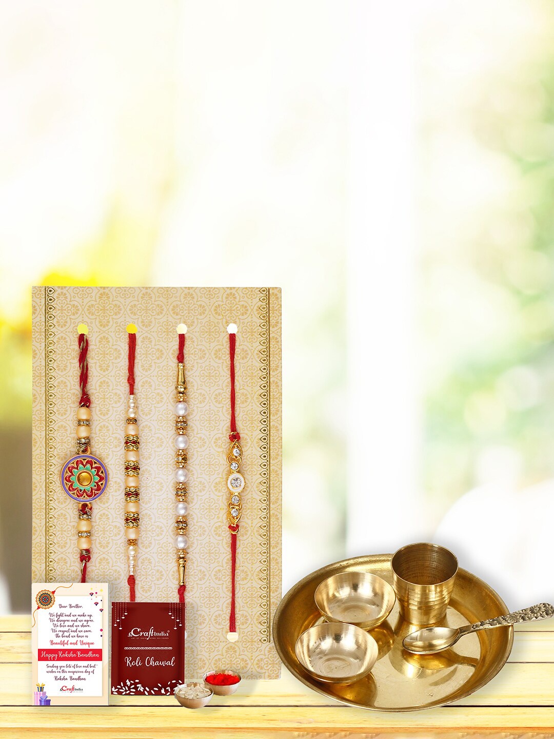 

eCraftIndia Unisex Set of 4 Rakhis With Pooja Thali, Roli Chawal & Greeting Card, Red