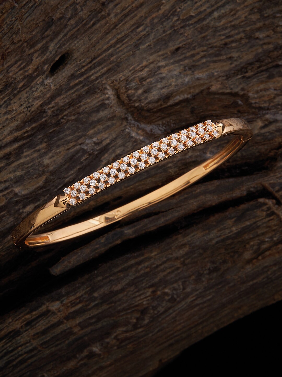 

Kushal's Fashion Jewellery Cubic Zirconia Gold-Plated Kada Bracelet