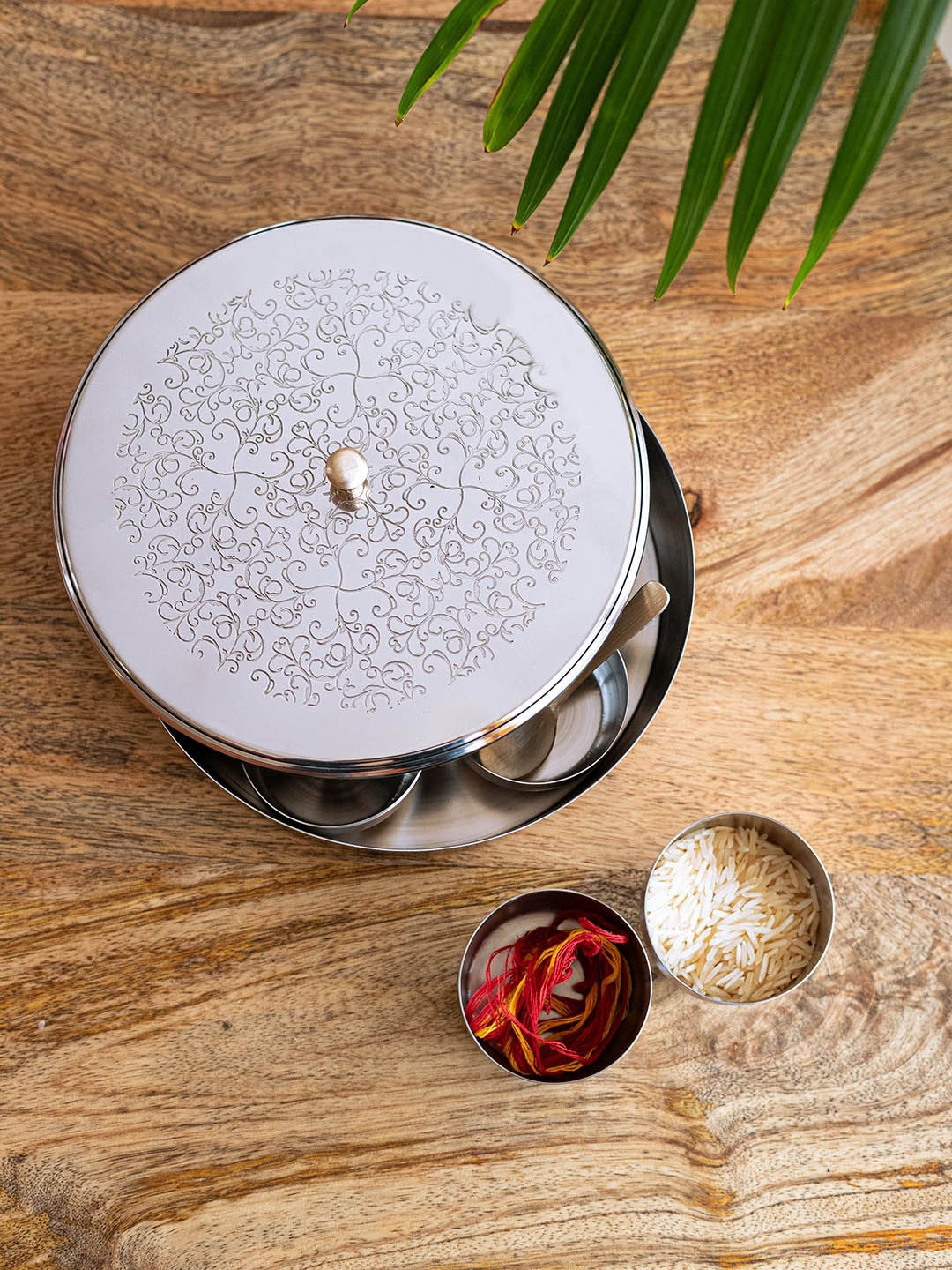 

ExclusiveLane Textured Pooja Box With Spoon & 7 Containers 50ml Each, Silver