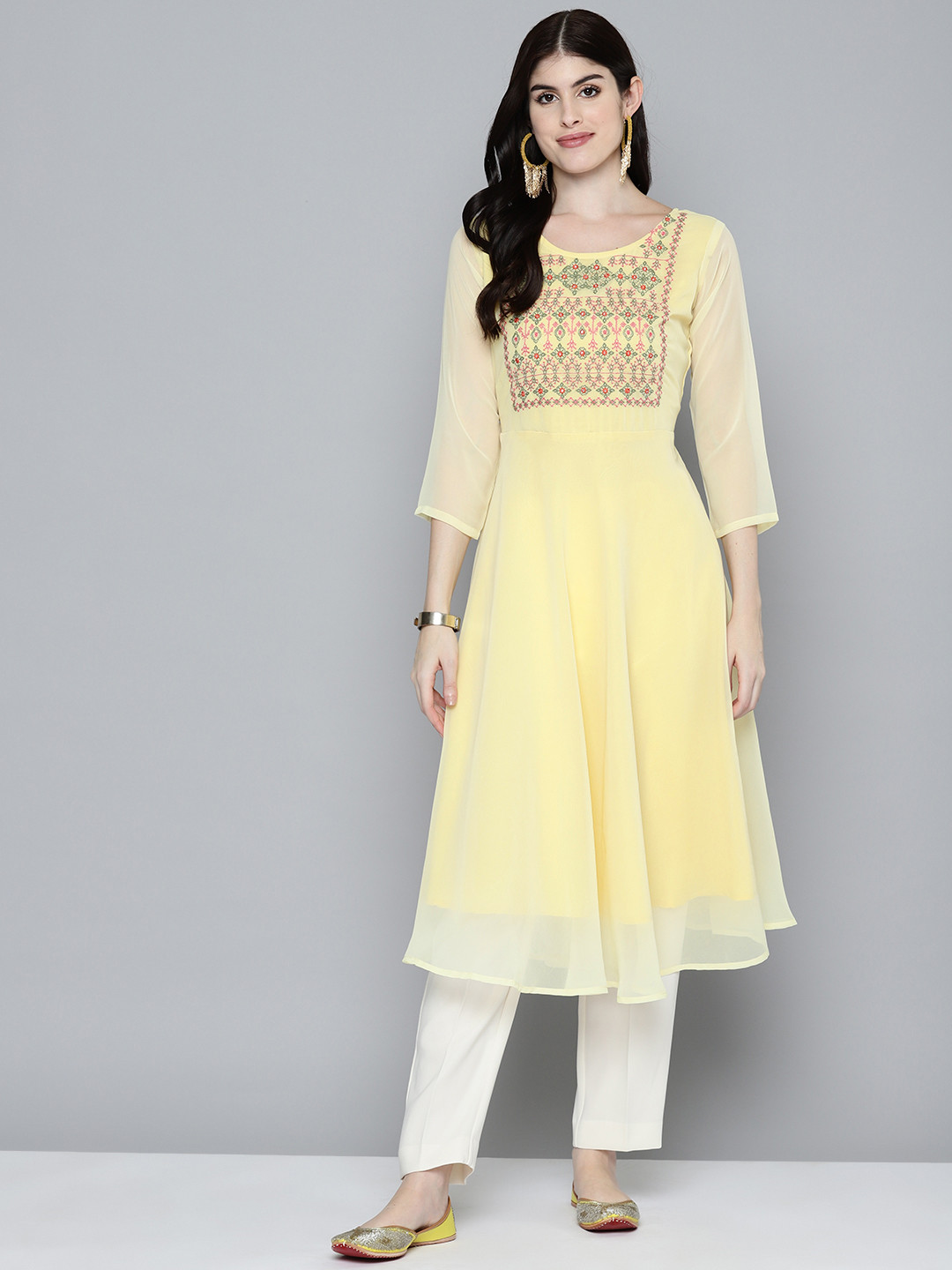 

Jompers Ethnic Motifs Embroidered Thread Work Georgette Kurta, Yellow