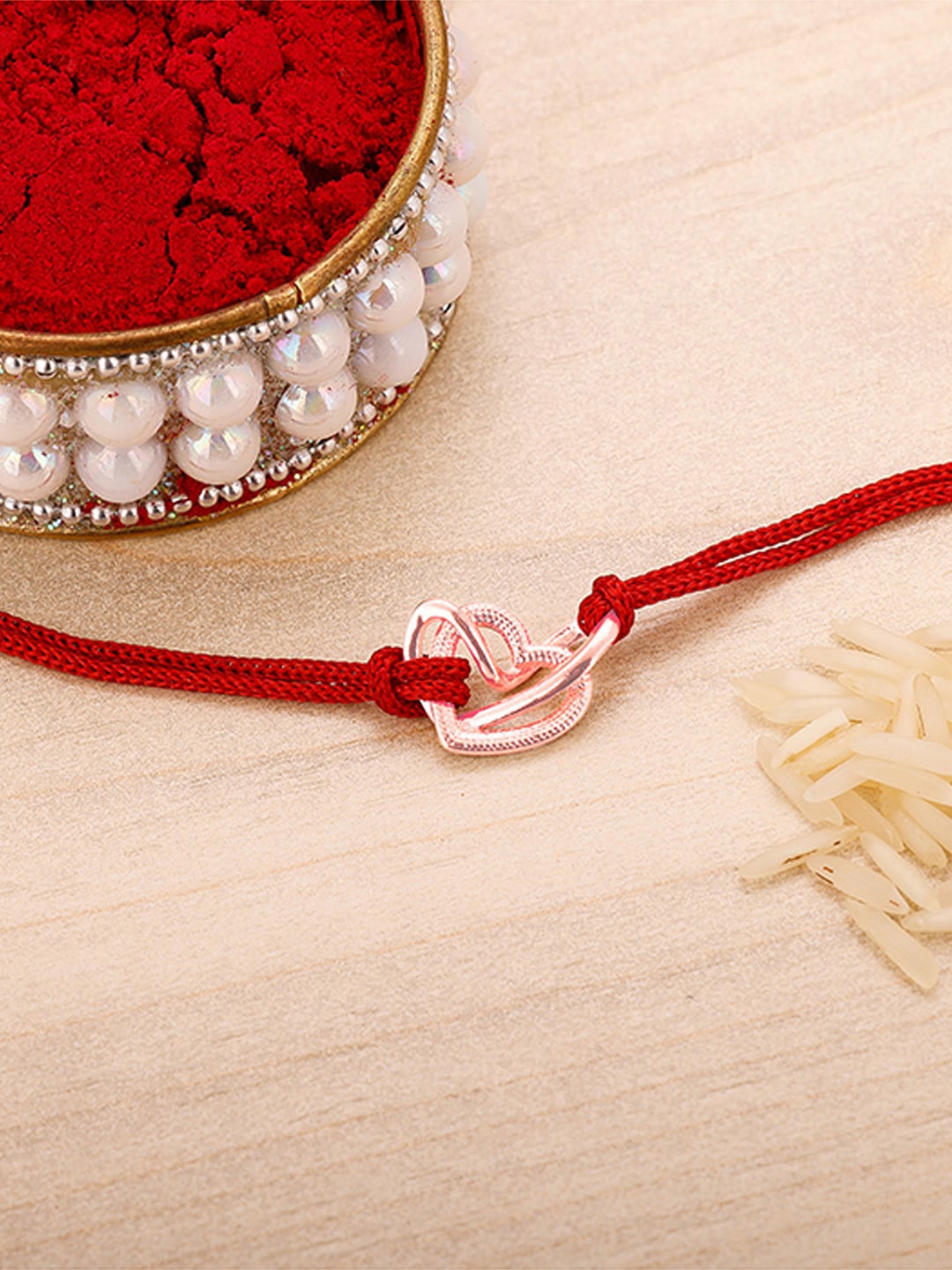

GIVA 925 Sterling Silver Rose Gold-Plated Two Hearts Rakhi With Roli Chawal