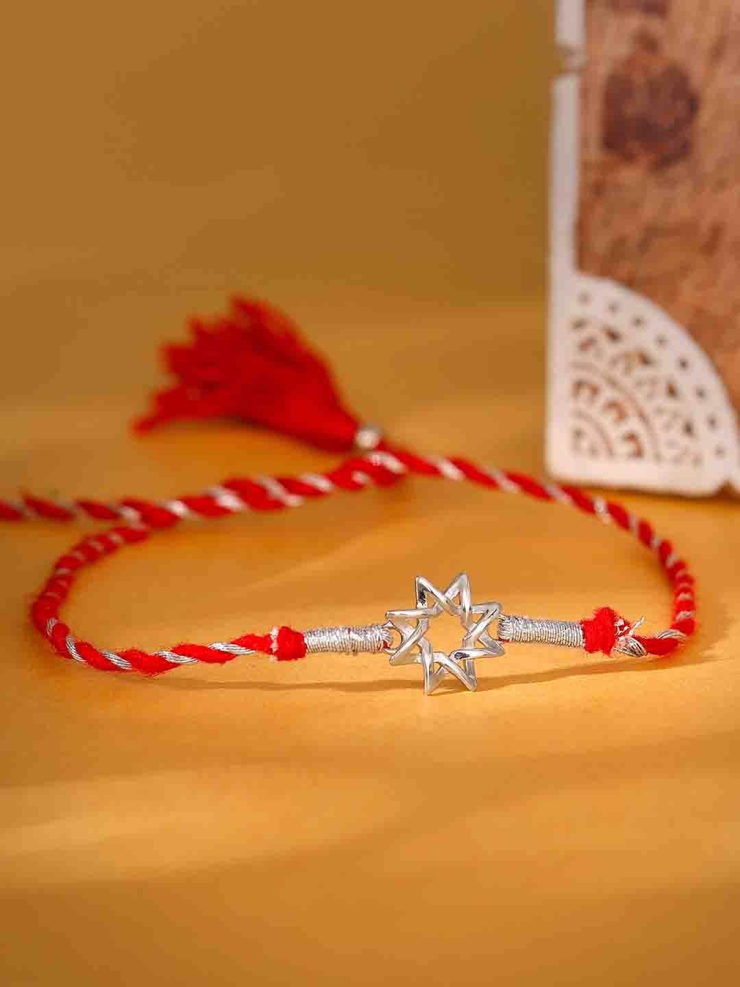 

GIVA 925 Sterling Silver Floral Charm Rakhi with Roli Chawal