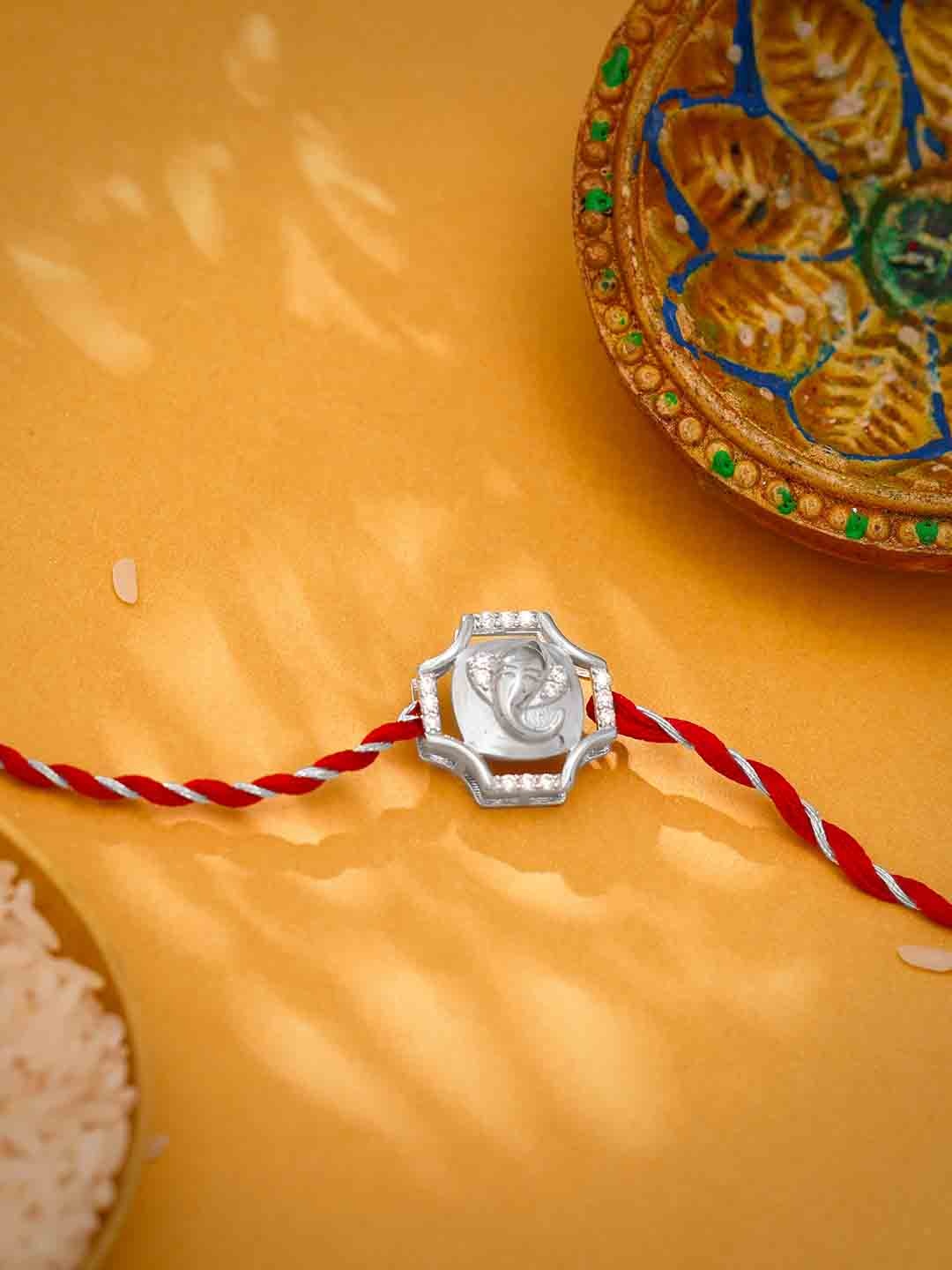 

GIVA 925 Sterling Silver Ganesha Charm Stone Studded Rakhi with Roli Chawal