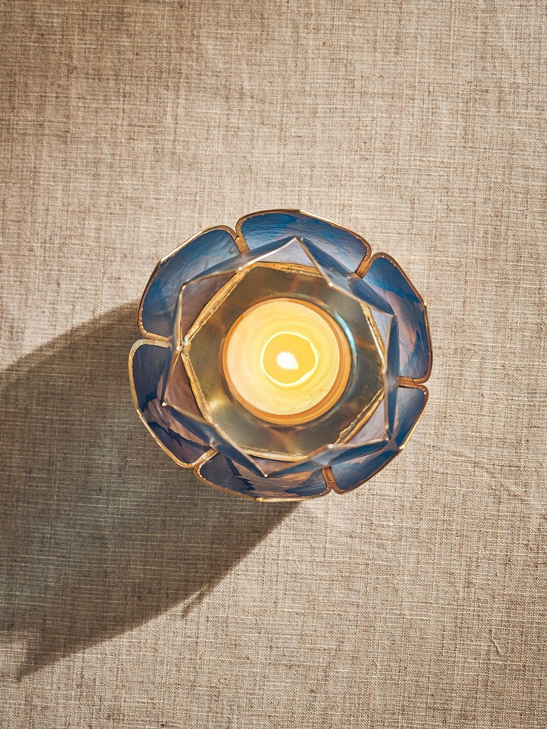 

Pure Home and Living Blue & Gold Toned T-Light Holder
