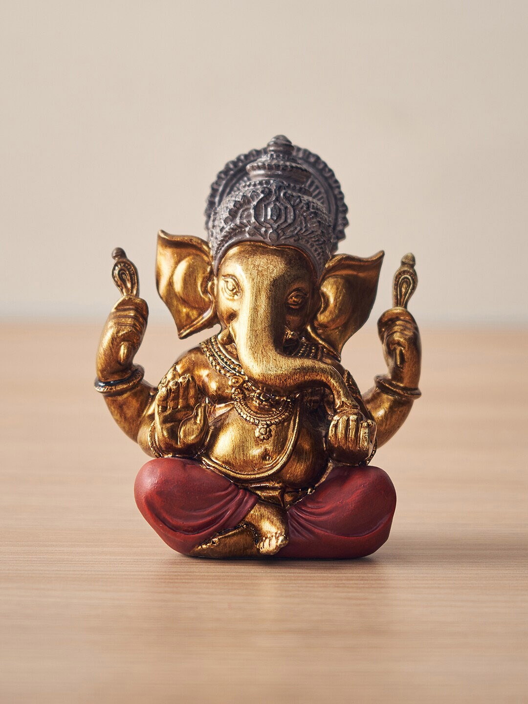 

Pure Home and Living Red Sitting Ganesha Idol Showpiece