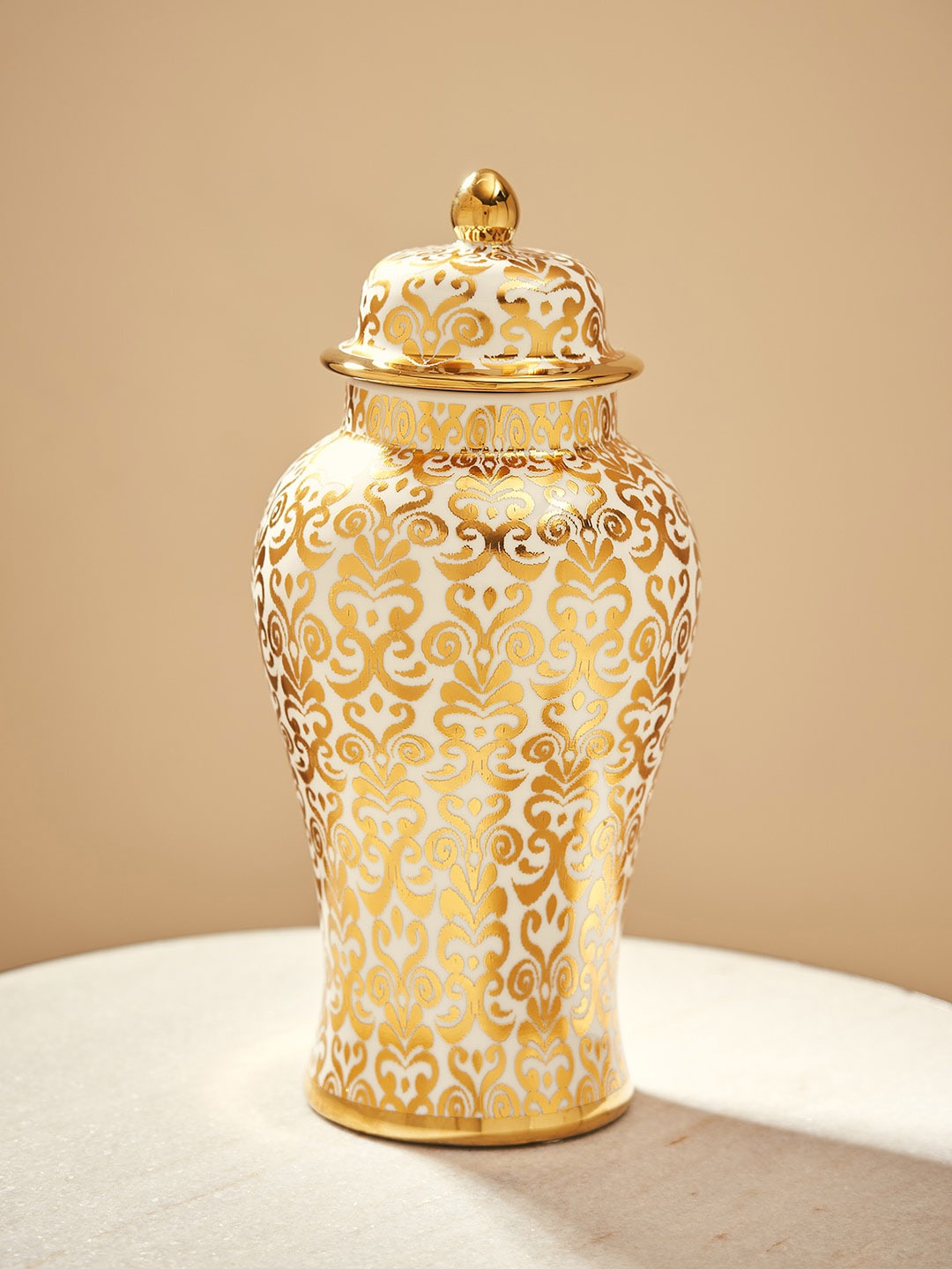 

Pure Home and Living Gold & Ivory Paisley Printed Ceramic Showpiece