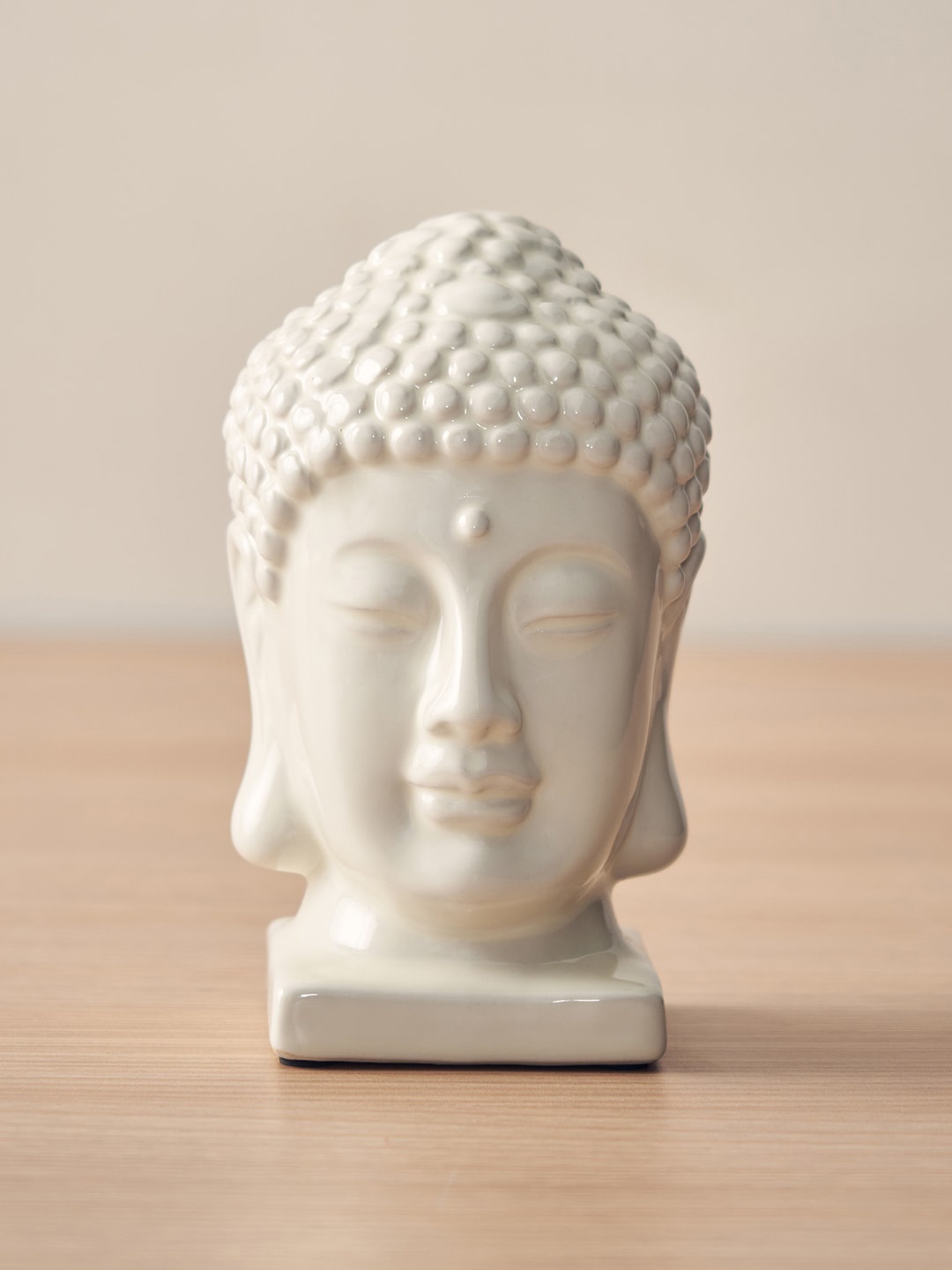 

Pure Home and Living White Textured Buddha IdolShowpiece