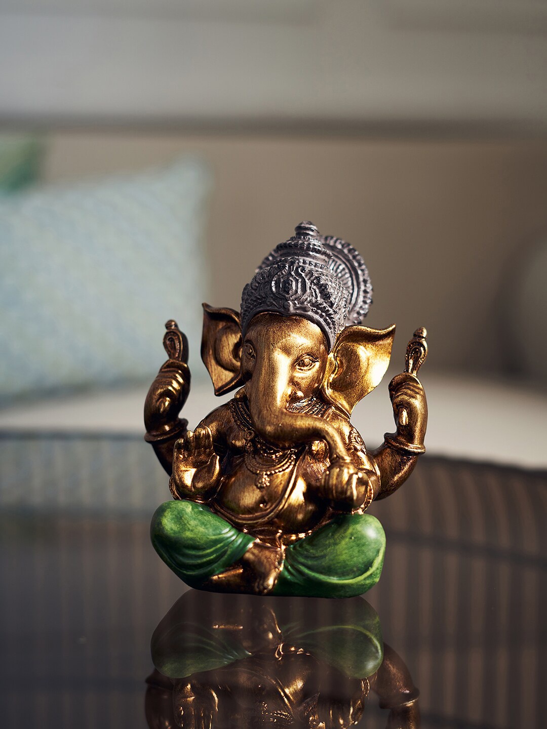

Pure Home and Living Green & Brown Textured Ganesha Idol Showpiece