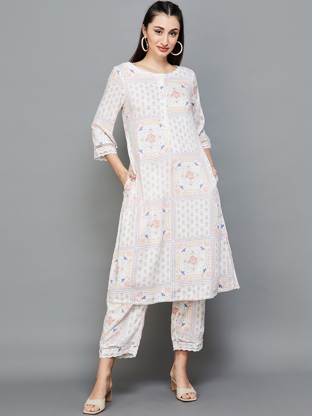 

Melange by Lifestyle Ethnic Motifs Printed Regular Kurta with Trousers, Off white