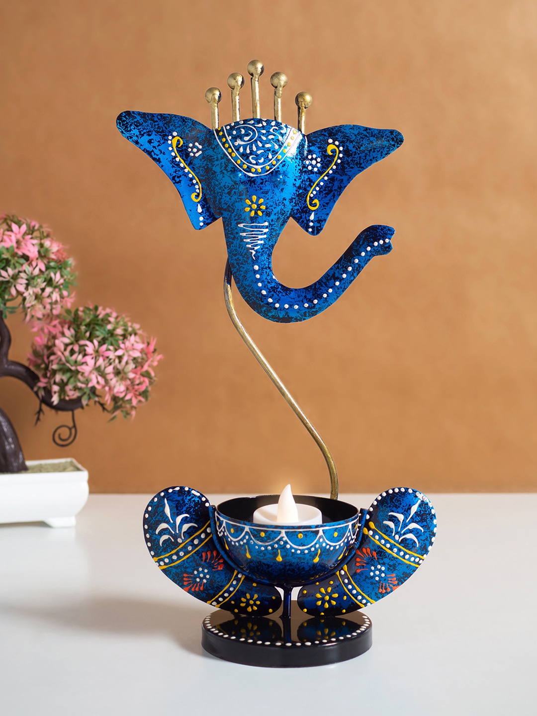 

Golden Peacock Blue & White Ganesha Showpiece