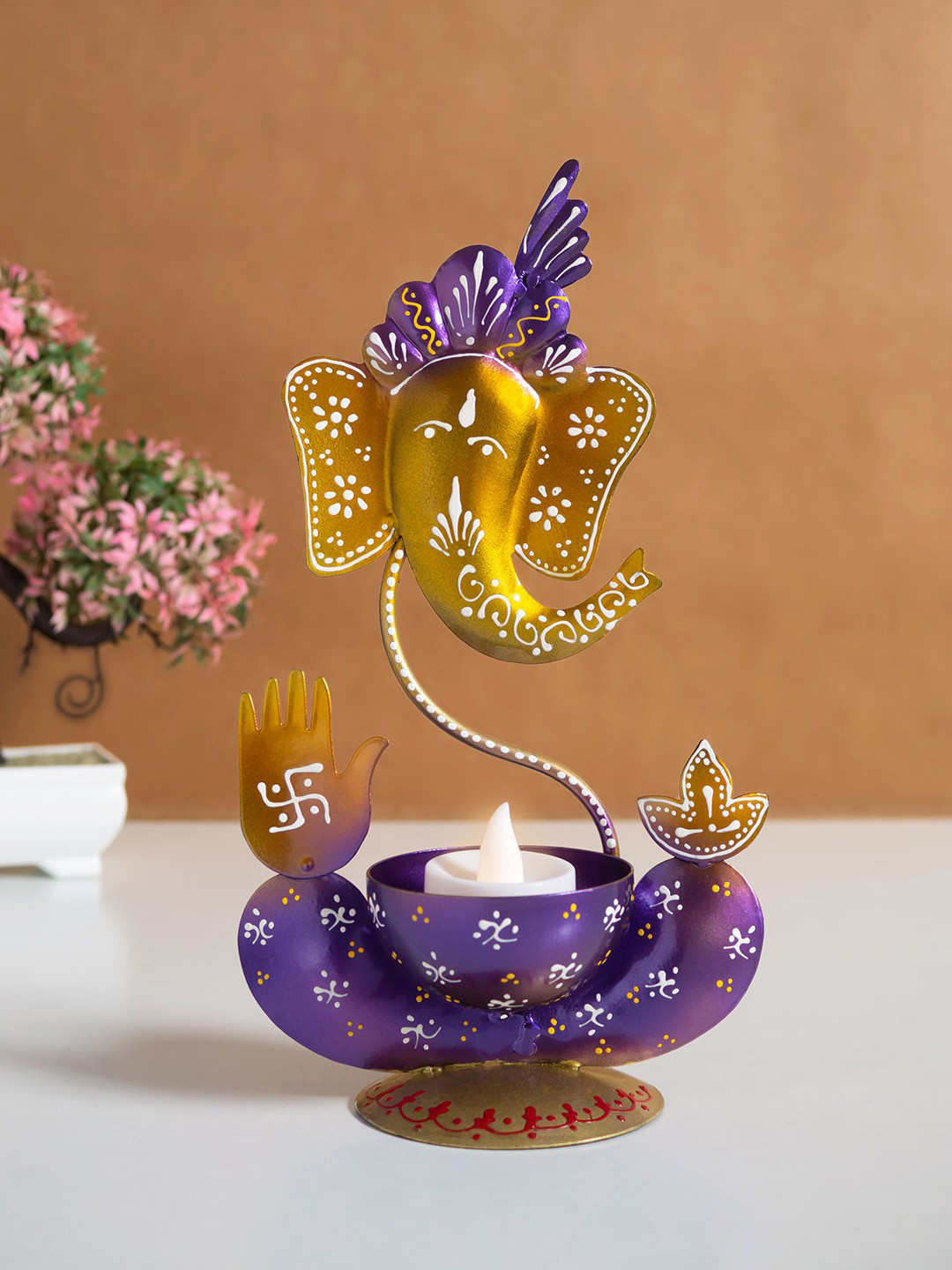 

Golden Peacock Purple & Metallic-toned Ganesha Metal Showpiece