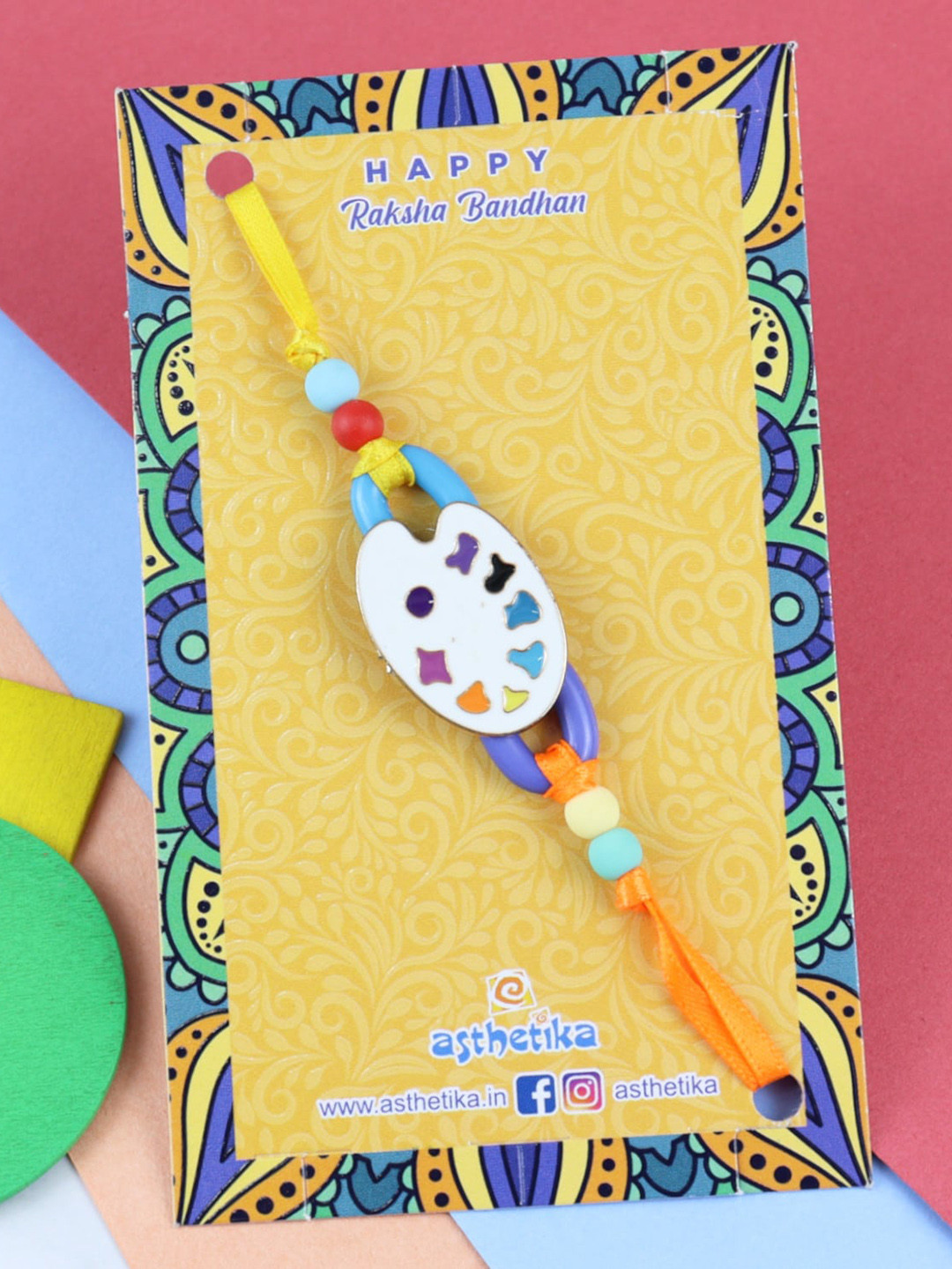

Asthetika Boys Paint Palette Charm Beaded Rakhi, White