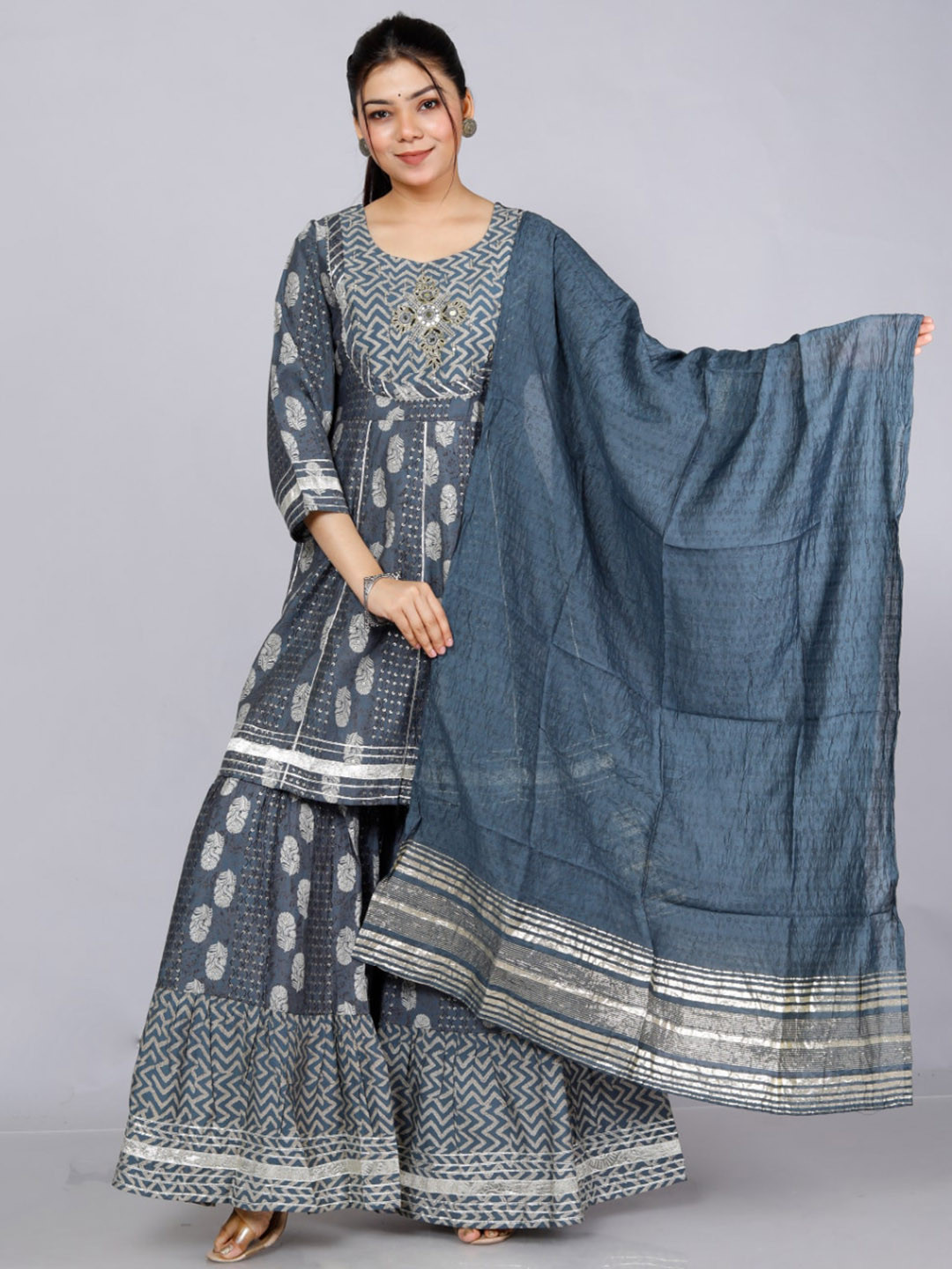 

KALINI Floral Printed Mirror Work Kurta with Sharara & With Dupatta, Grey