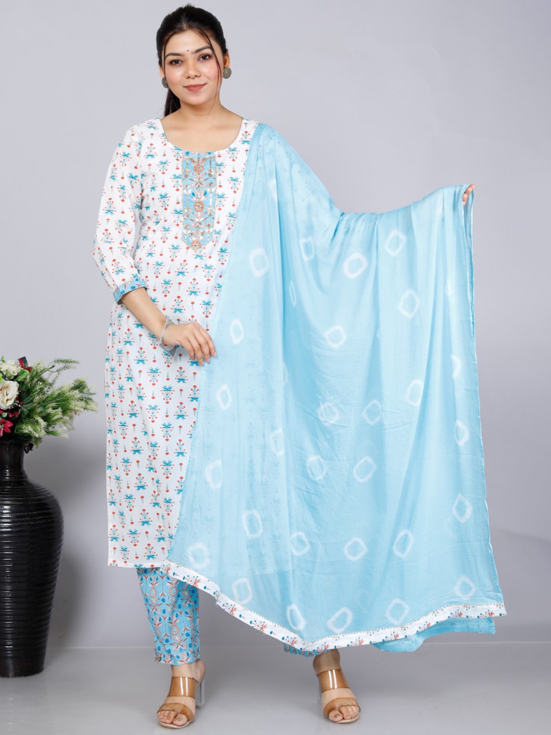 

KALINI Floral Printed Sequined Work Kurta with Trousers & With Dupatta, Blue