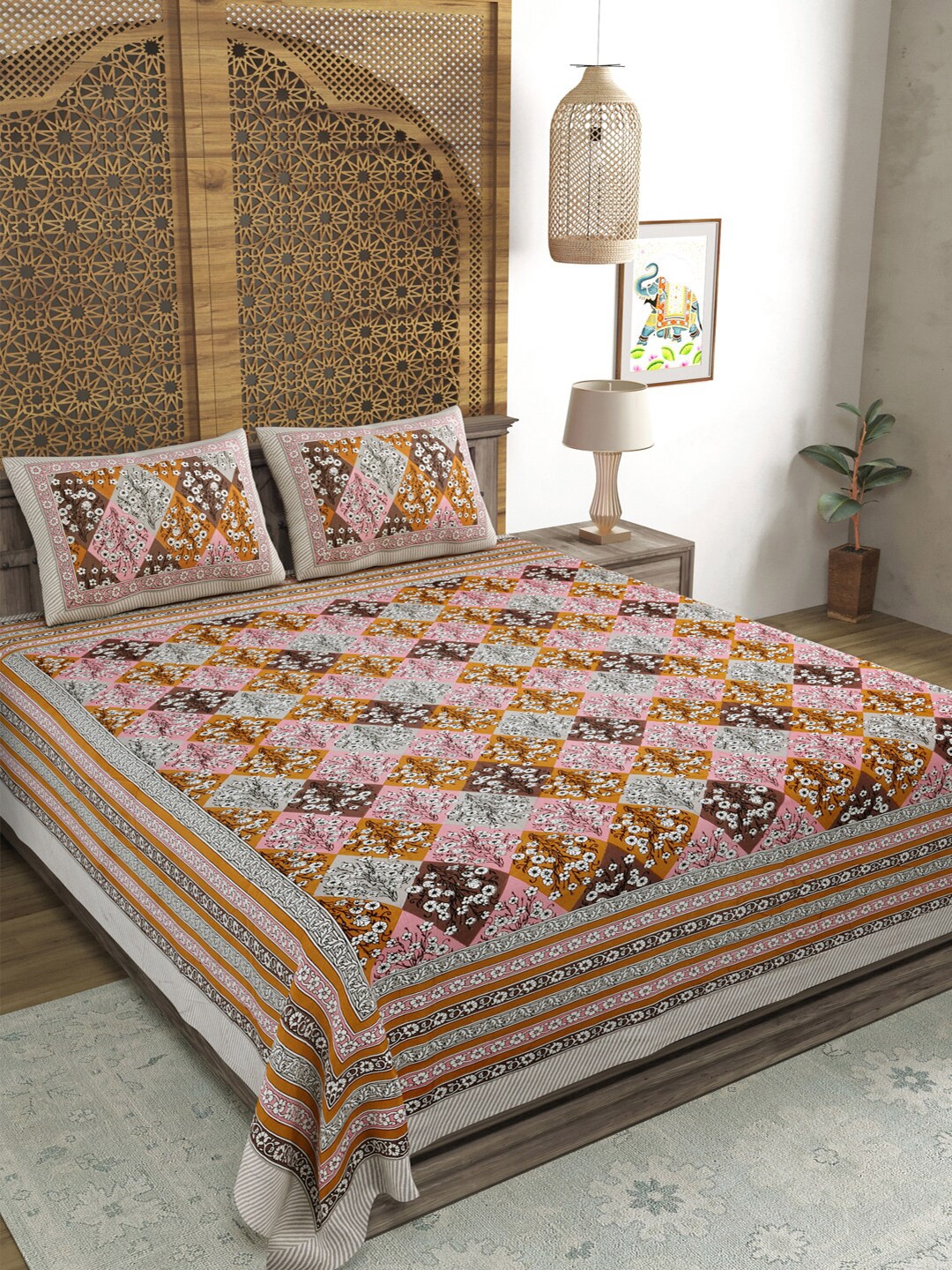 

Sangria Brown & White Floral Printed Cotton 210 TC King Bedsheet With 2 Pillow Covers