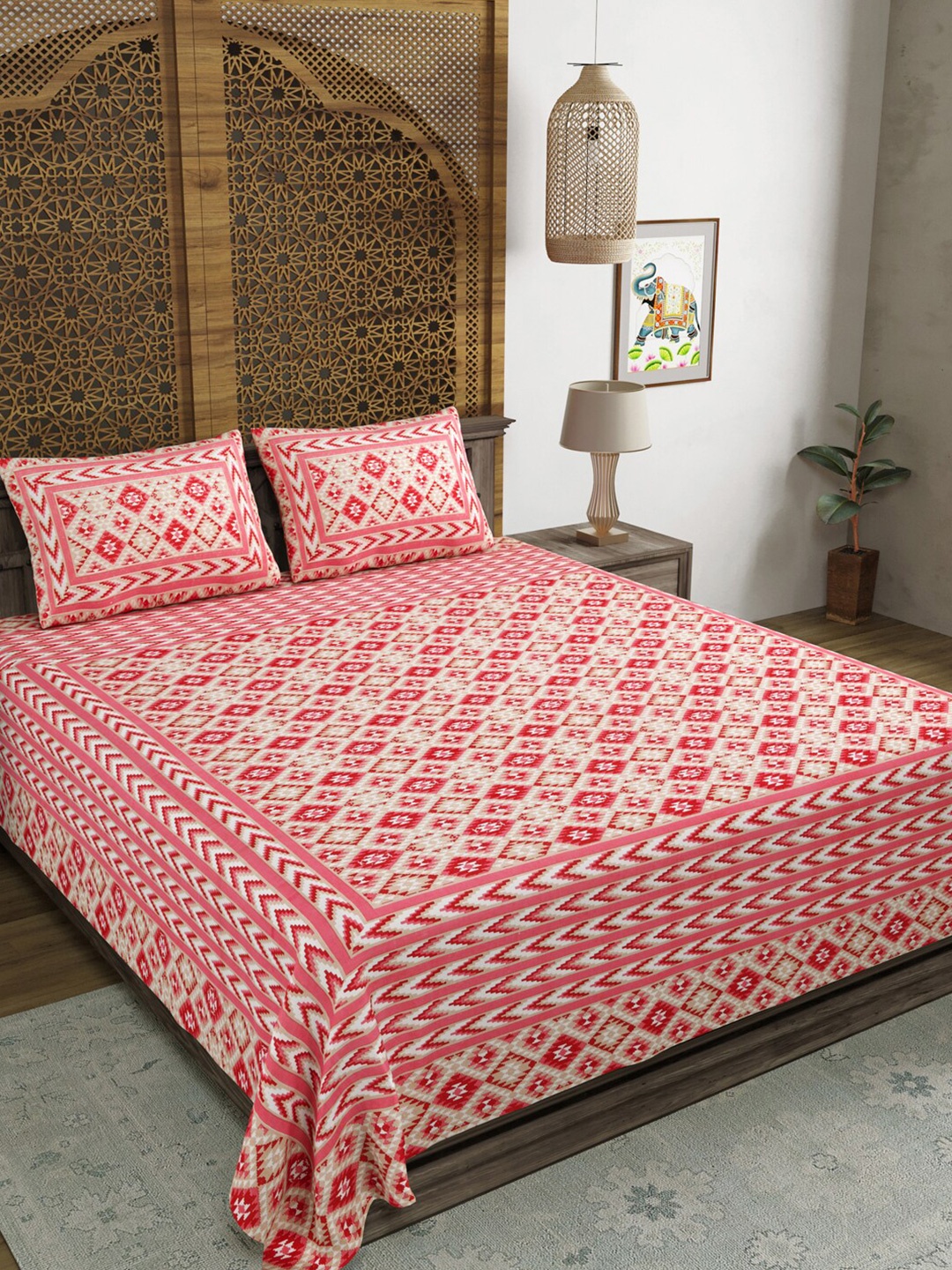 

Sangria Peach-Colored & Red Geometric Cotton 210 TC King Bedsheet With 2 Pillow Covers