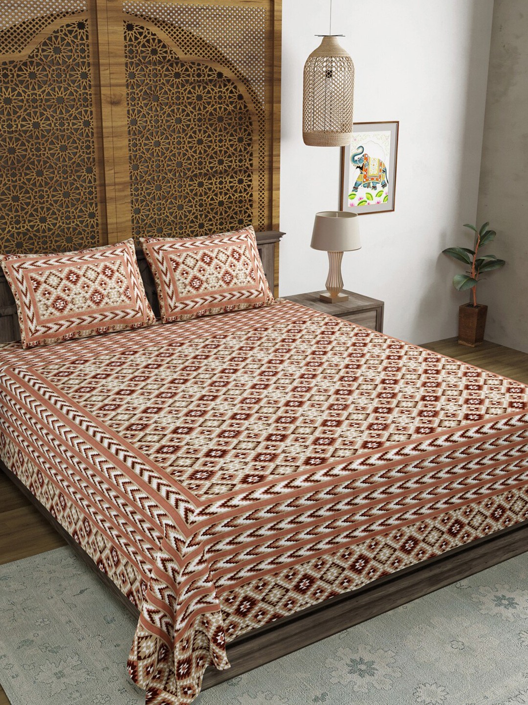 

Sangria Brown & White Ethnic Motifs Cotton 210 TC King Bedsheet With 2 Pillow Covers