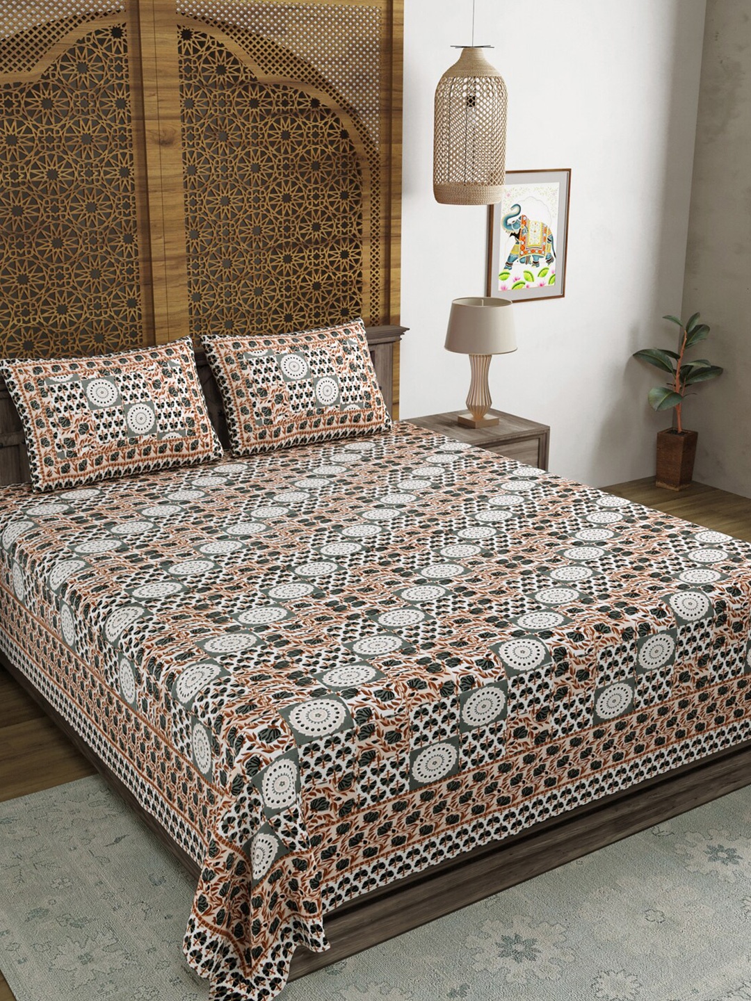

Sangria Brown & White Ethnic Motifs Printed Cotton 210 TC King Bedsheet & 2 Pillow Covers