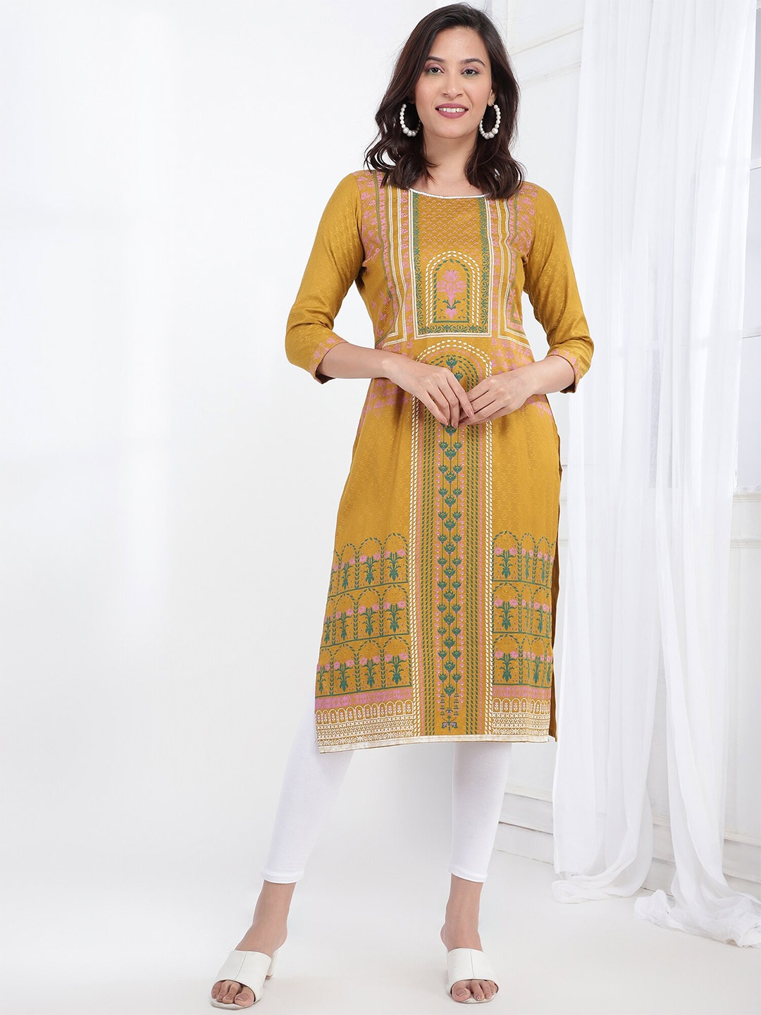 

Bani Women Ethnic Motifs Printed Sequins Round Neck Liva Straight Kurta, Mustard