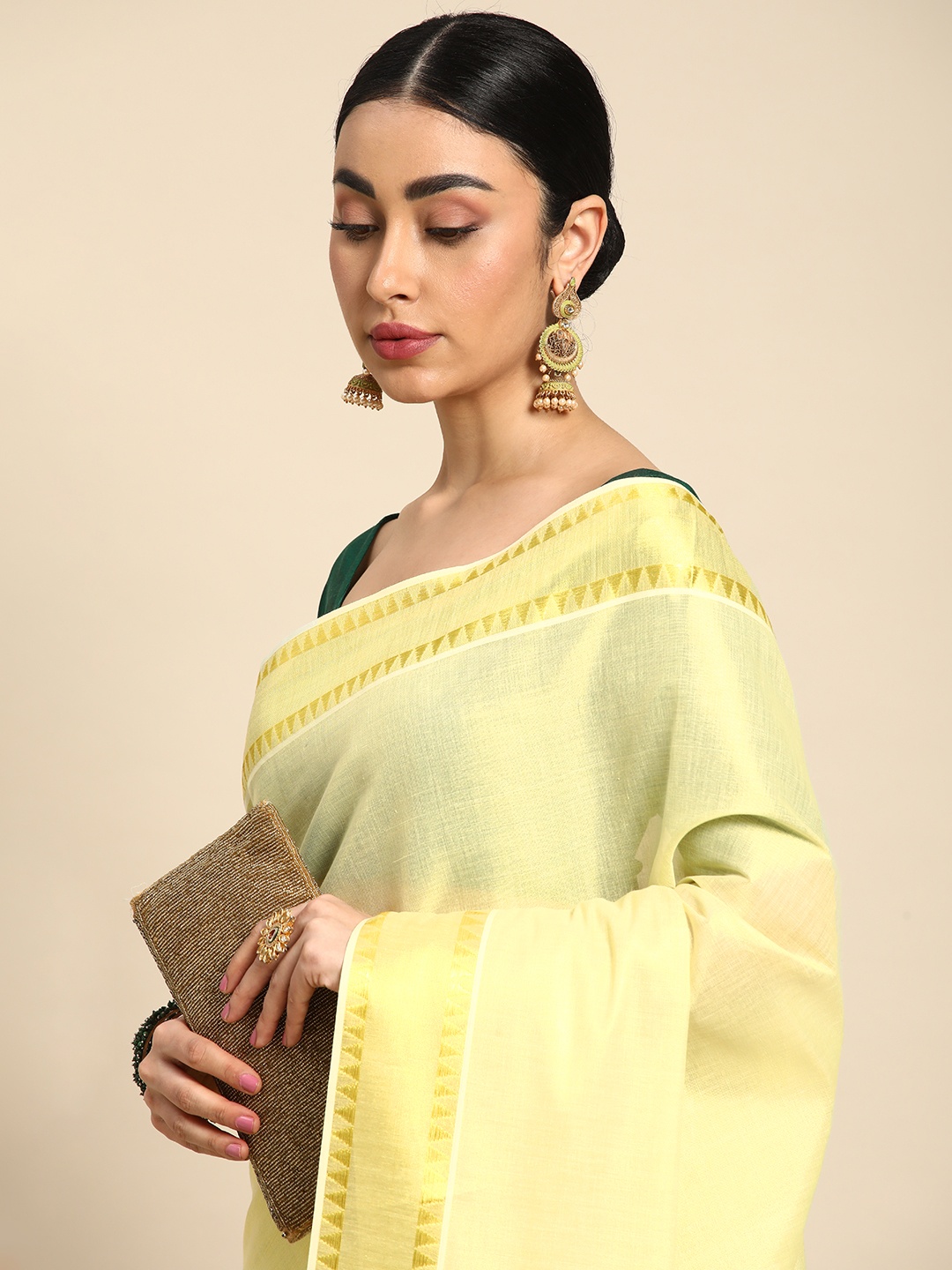 

Kalyan Silks Solid Zari Tissue Kasavu Saree, Gold
