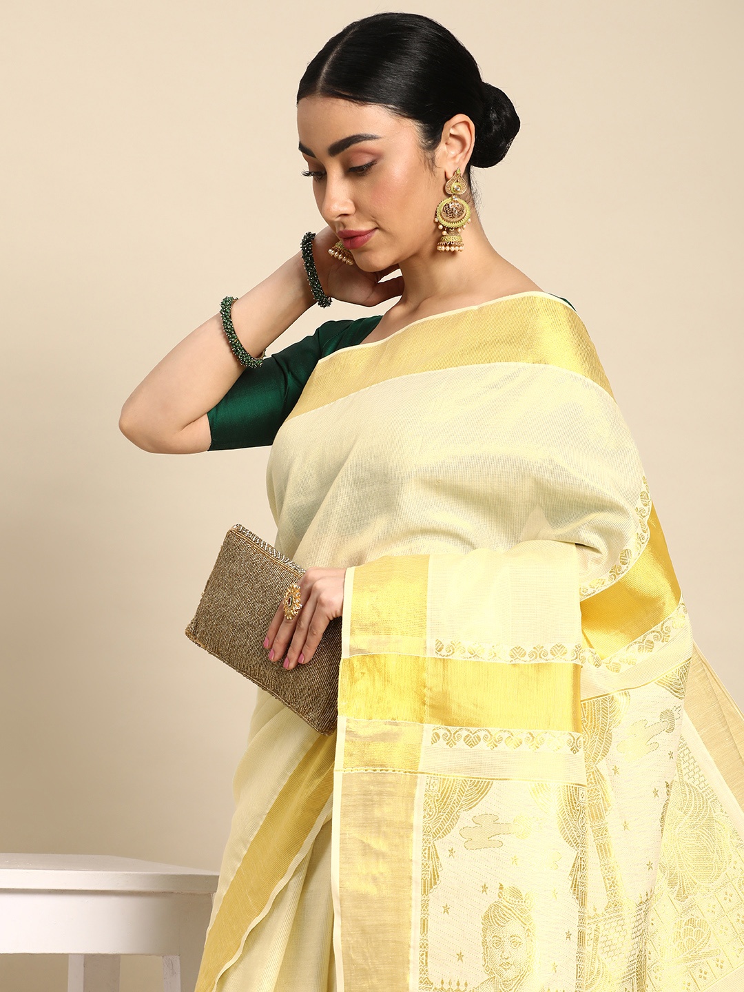 

Kalyan Silks Solid Zari Tissue Kasavu Saree, Gold