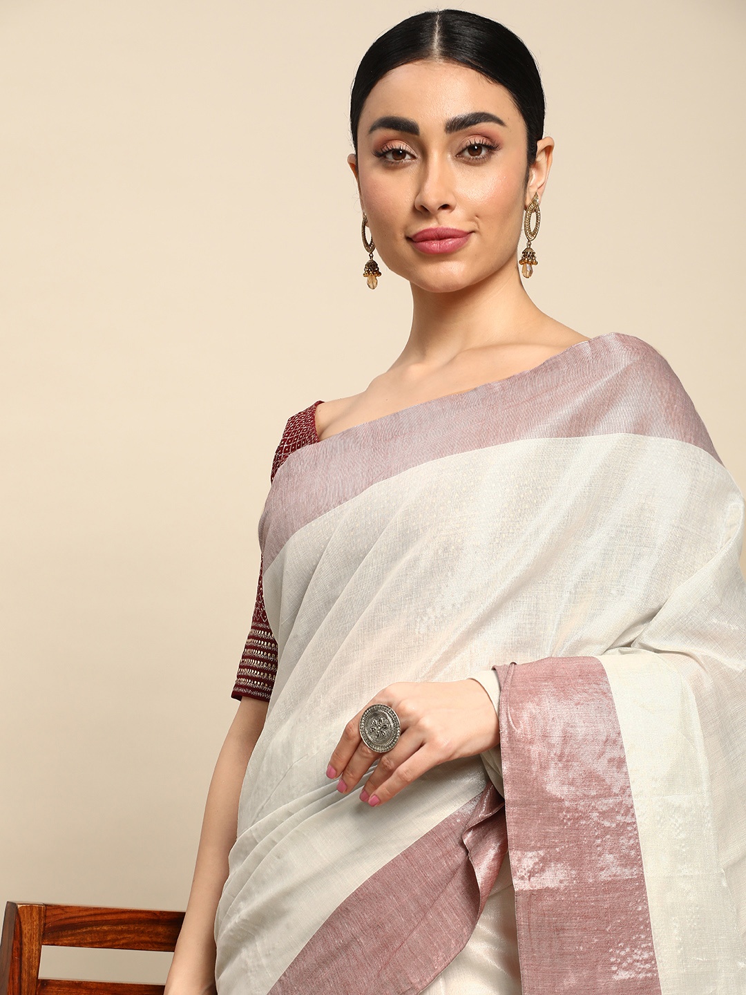 

Kalyan Silks Solid Zari Tissue Kasavu Saree, Silver