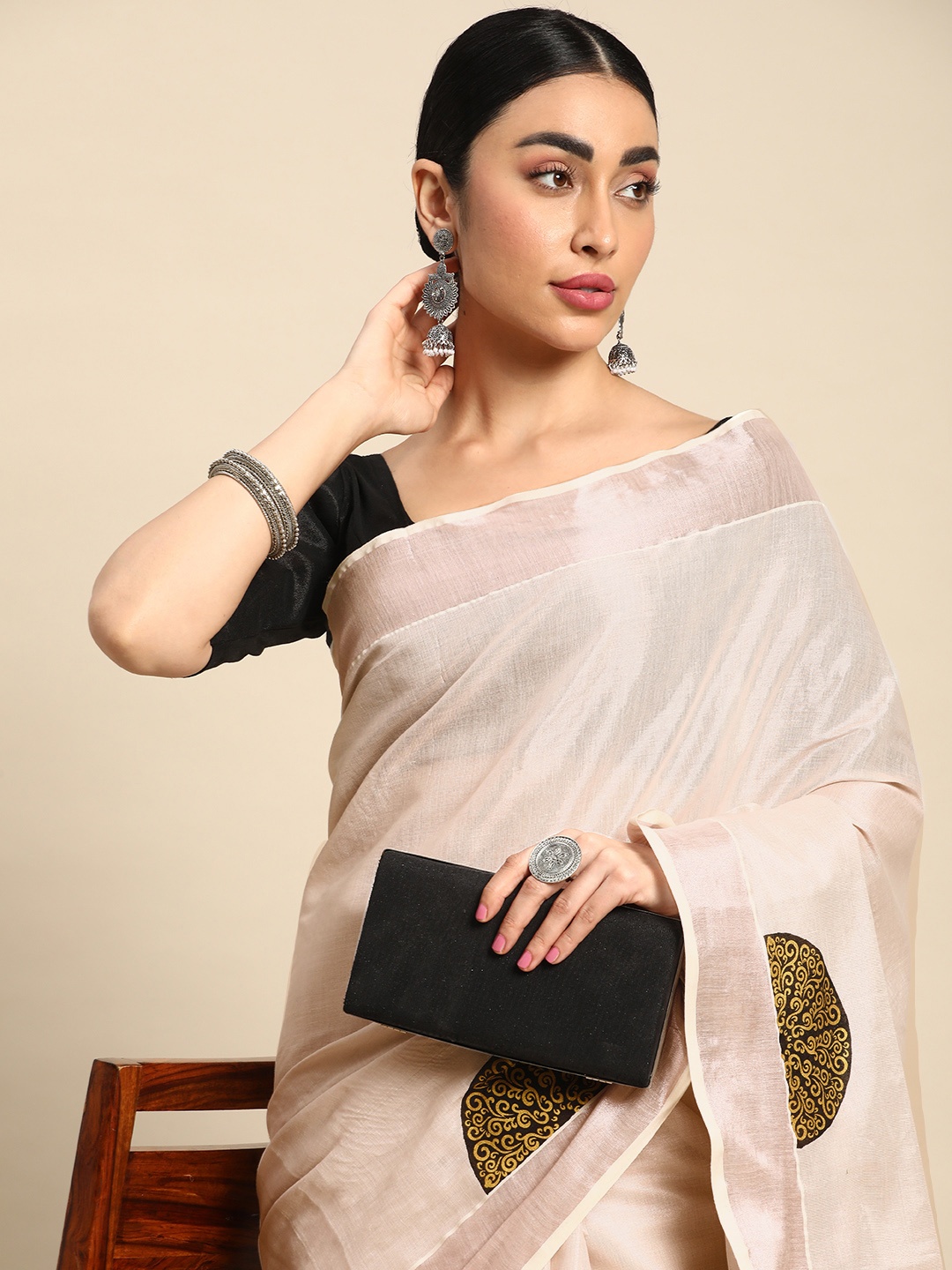 

Kalyan Silks Solid Zari Tissue Kasavu Saree, Rose gold