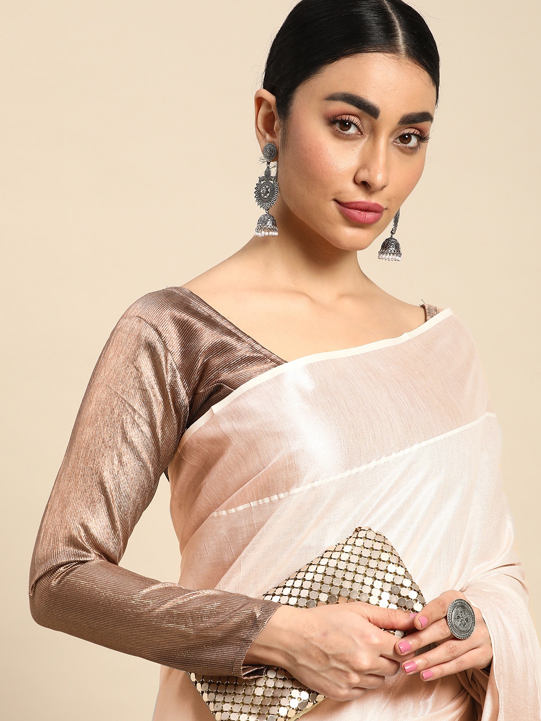 

Kalyan Silks Solid Zari Tissue Kasavu Saree, Rose gold