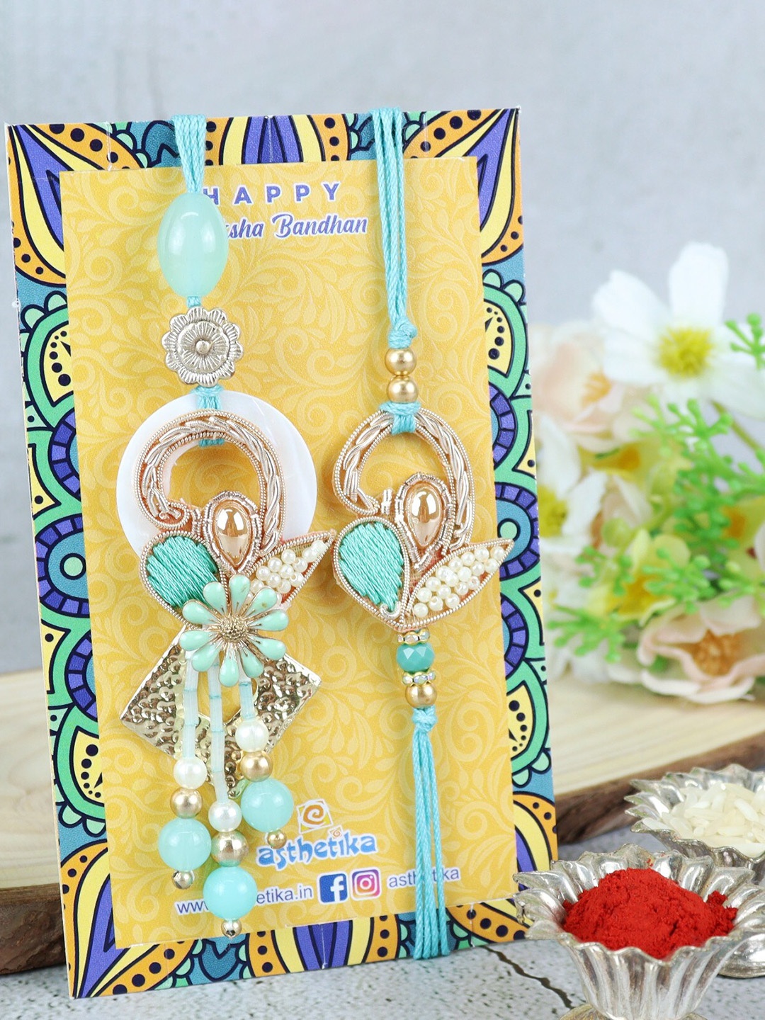 

Asthetika Set Of 2 Butti with Latkan Bhai Bhabhi Rakhi Set, Blue