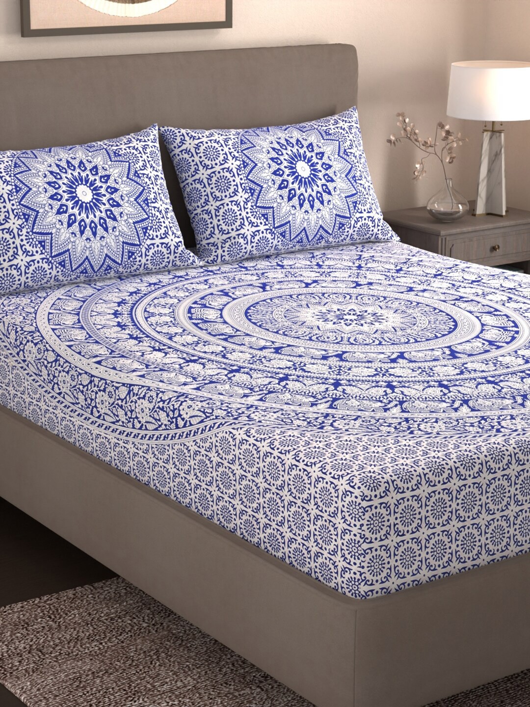 

Varde Blue & White Ethnic Motifs Cotton 210 TC King Bedsheet with 2 Pillow Covers