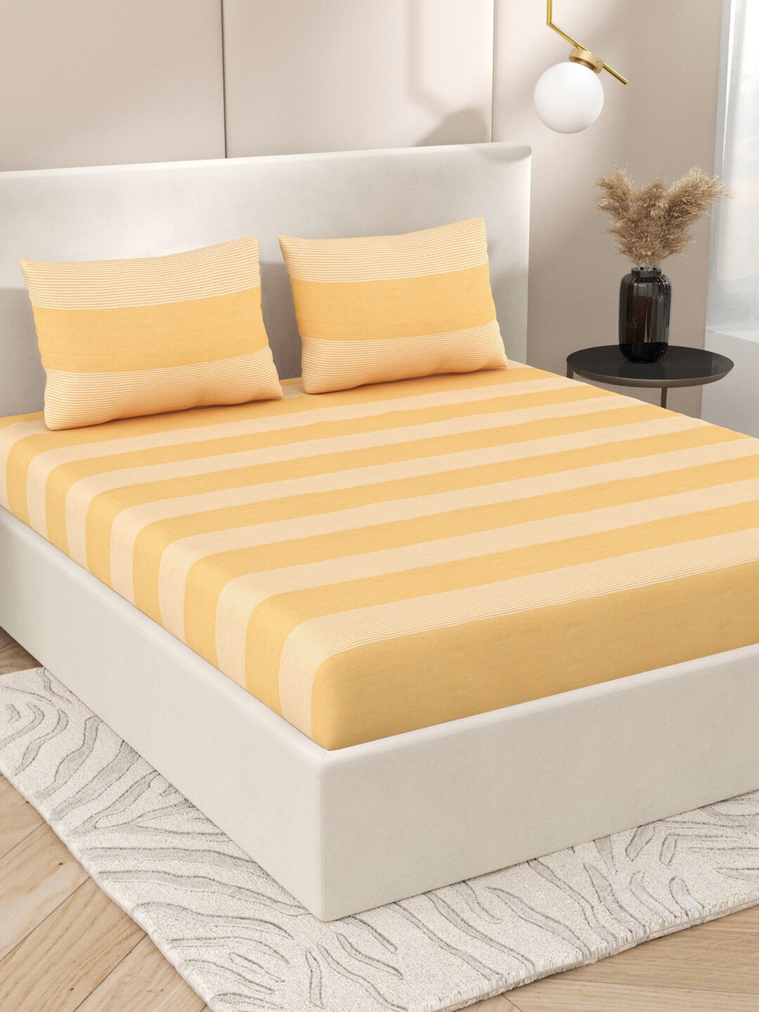 

Varde Yellow & White Striped Cotton 210 TC King Bedsheet With 2 Pillow Covers