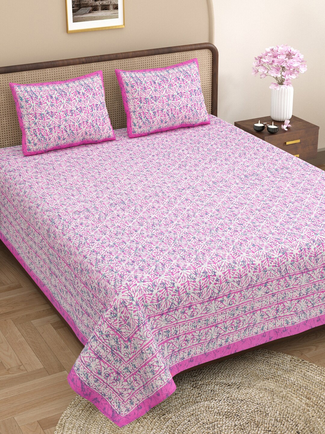 

Varde Pink & White Ethnic Motifs Printed 210 TC Cotton King Bedsheet Set 2.50 m x 2.25 m