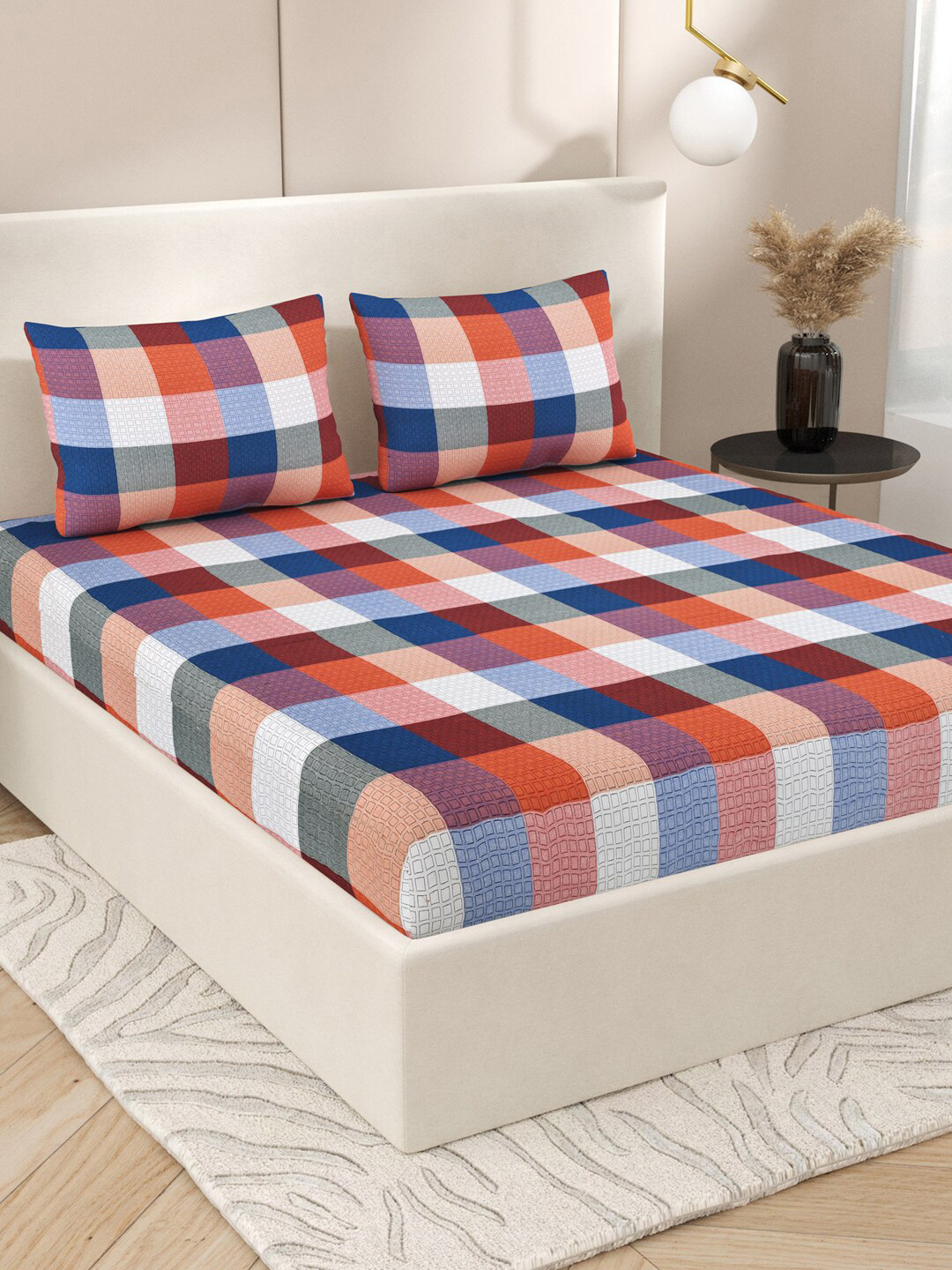 

Varde Pastel Red 210 TC Double Bedsheet with 2 Pillow Cover