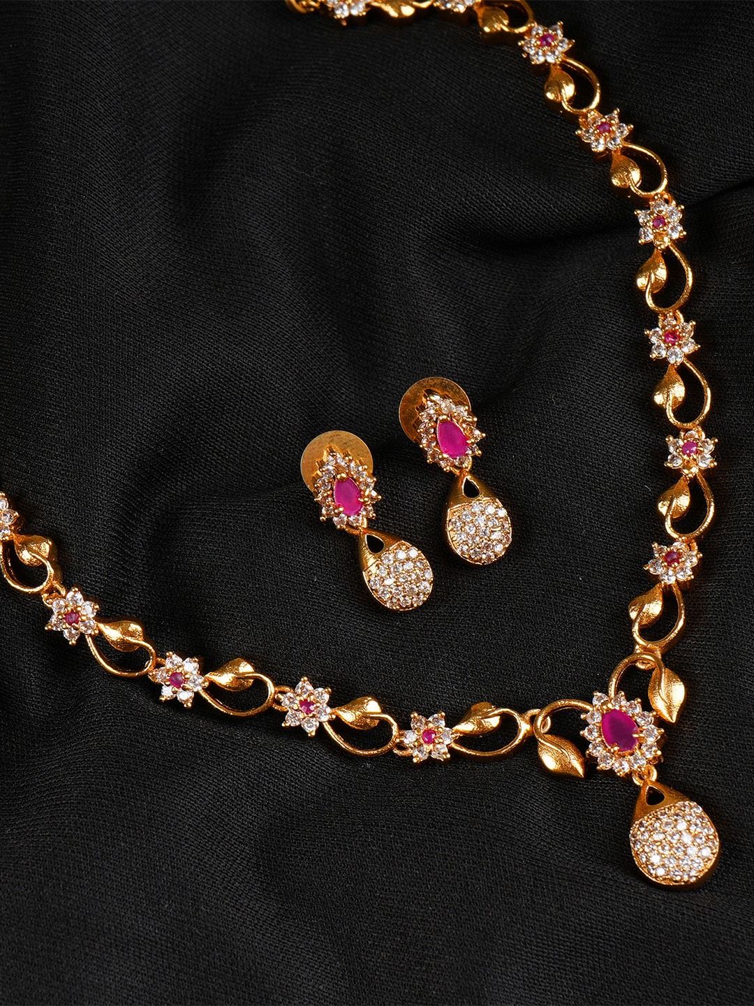 

Vriksham Brass Plated Artificial Stones Studded Necklace & Earrings Set, Gold