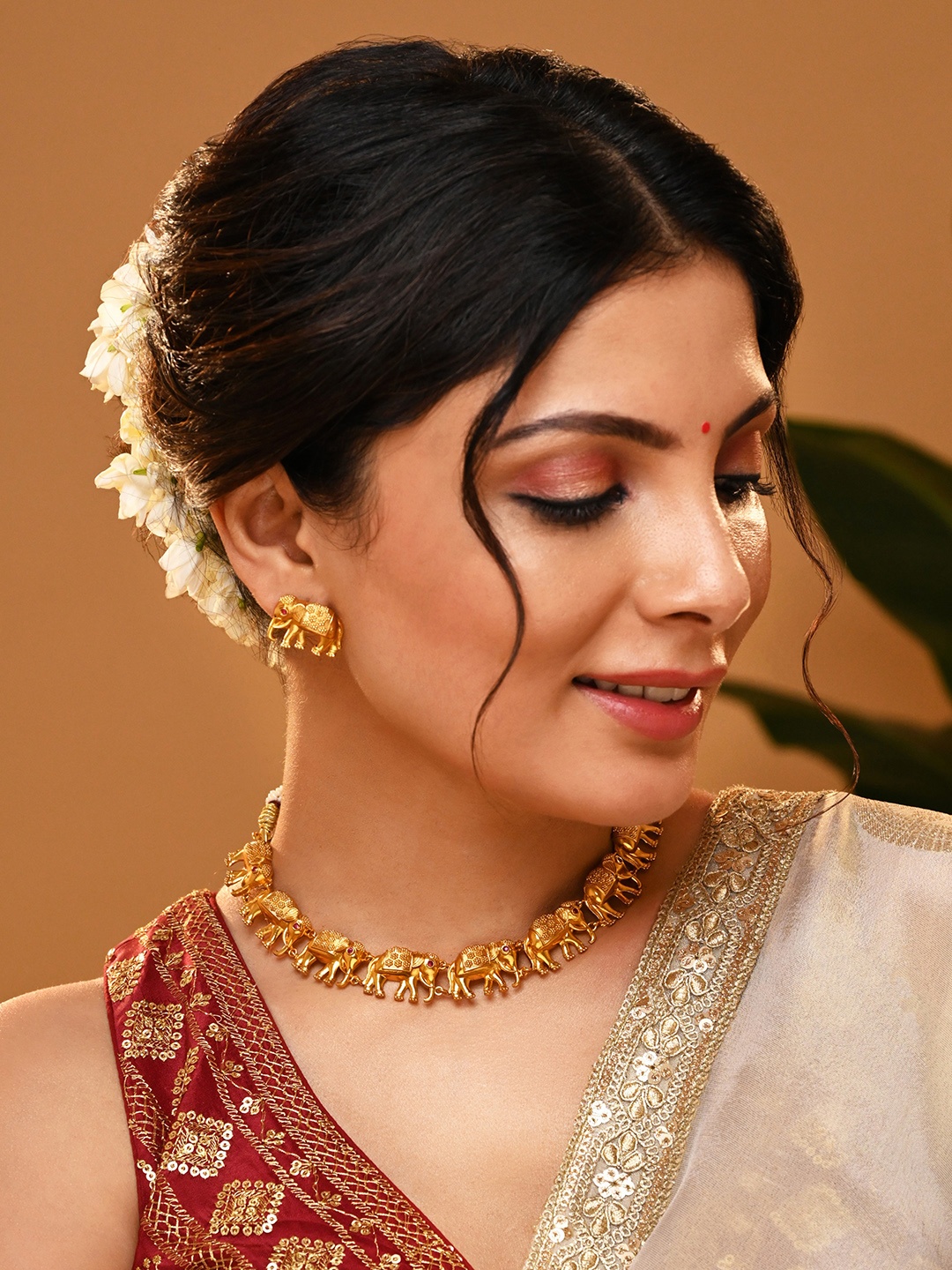 

Vriksham Brass Plated Elephant Shape Necklace & Earrings Set, Gold