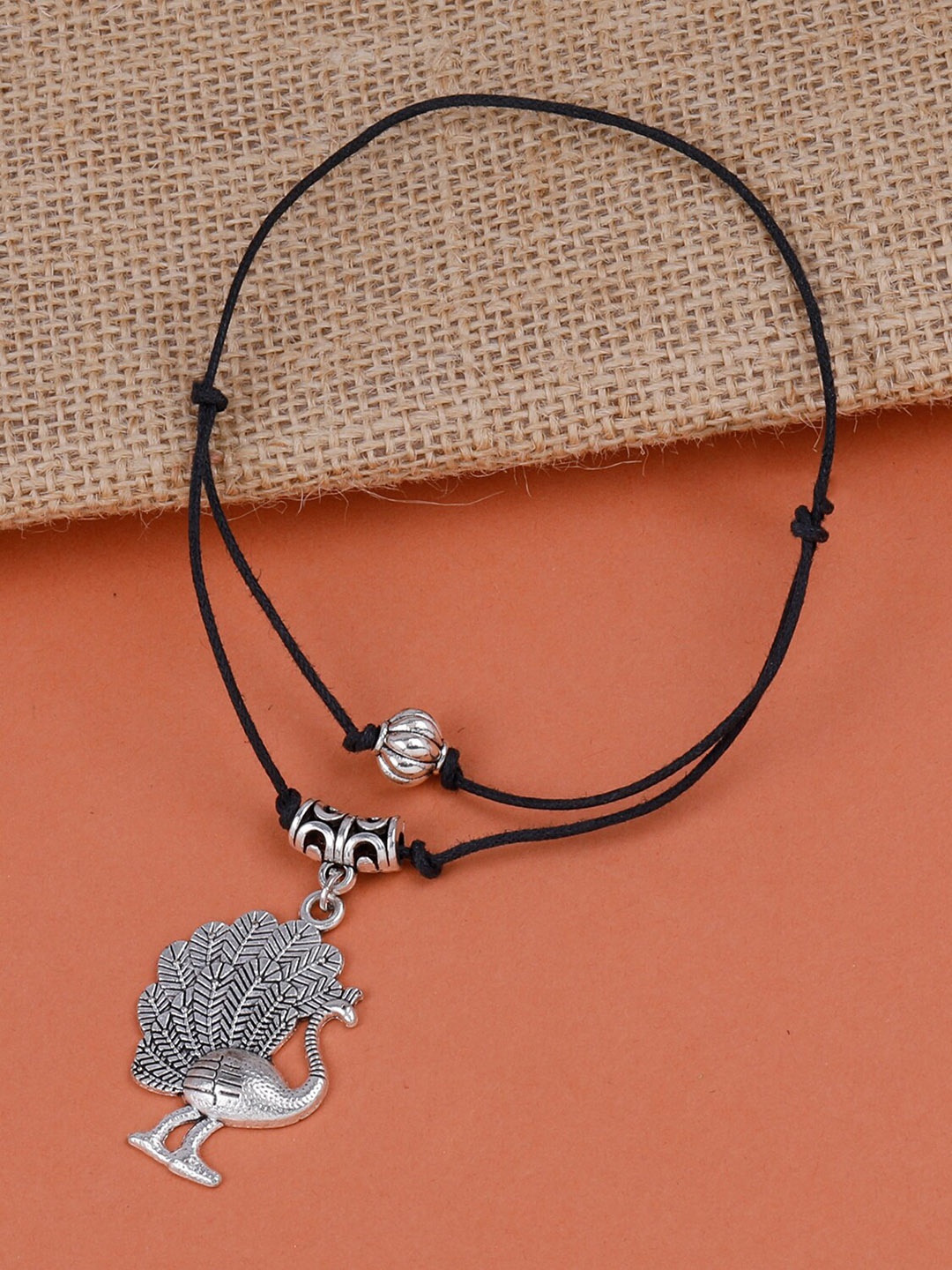 

Silver Shine Set Of 4 Silver-Plated Beaded Oxdised Nazriya Cotton Dori Anklets