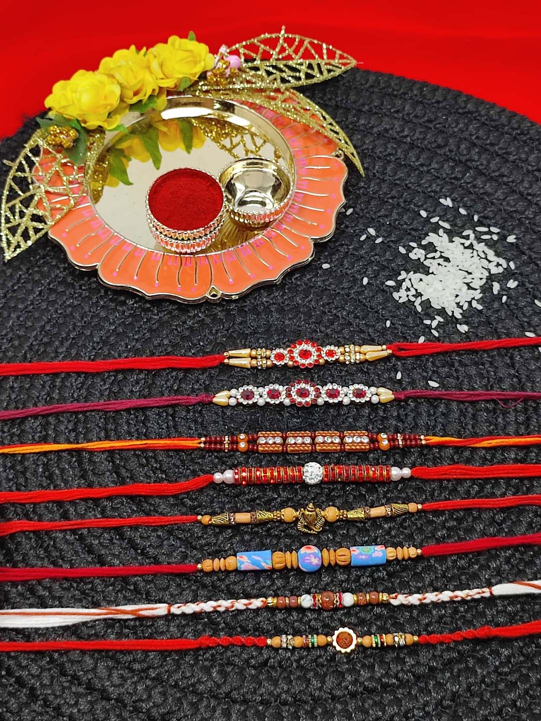 

CRAYTON Set Of 8 Thread Rakhi With Roli Chaval Box & Plate, Red