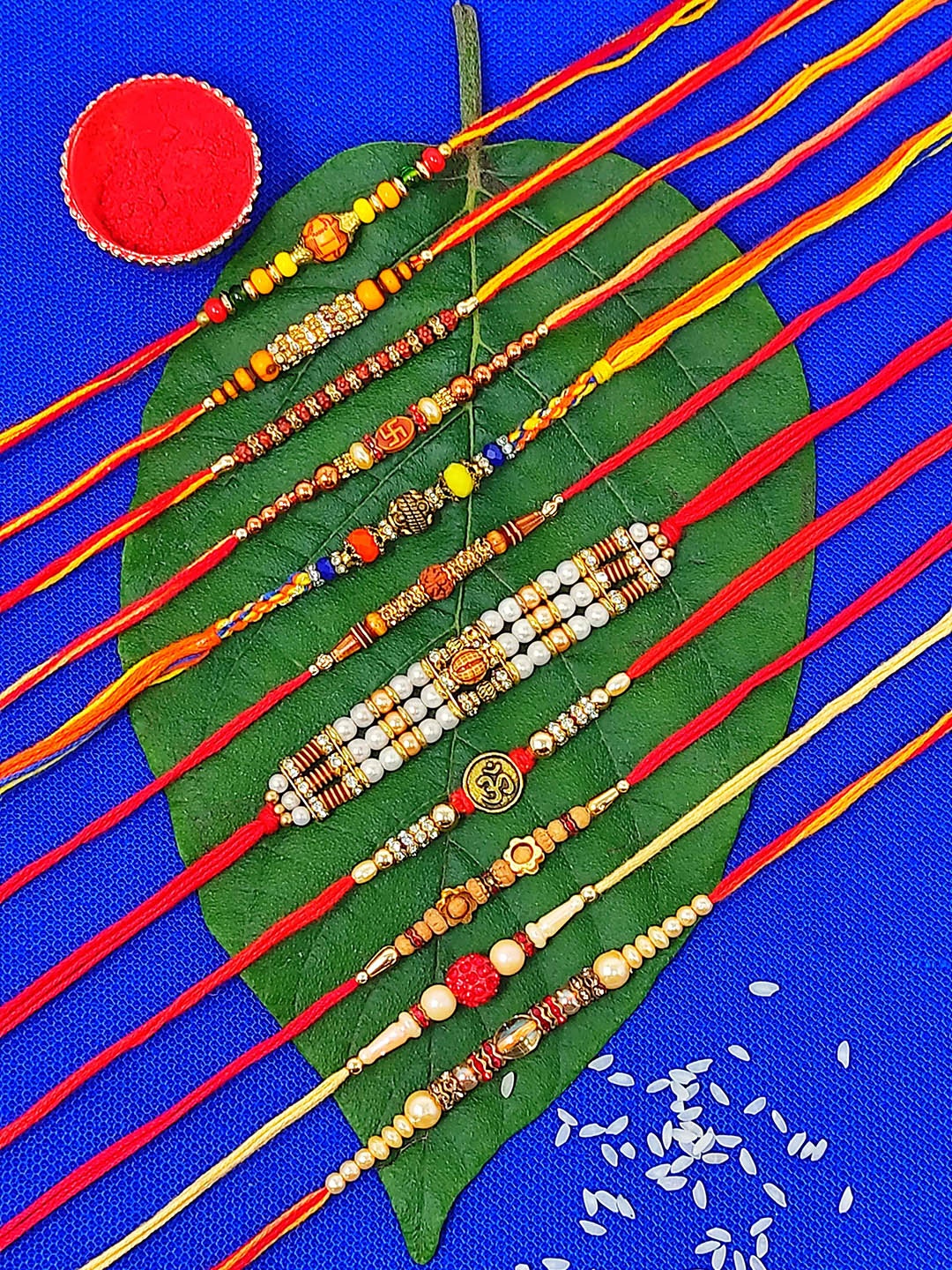 

CRAYTON Men Set Of 11 Modern Yet Traditional Rakhis, Red