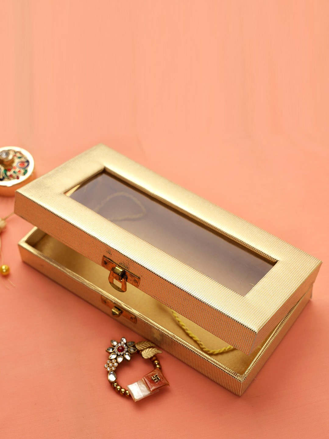 

Aapno Rajasthan Unisex Set Of 2 Studded Rakhi Gift Set, Gold