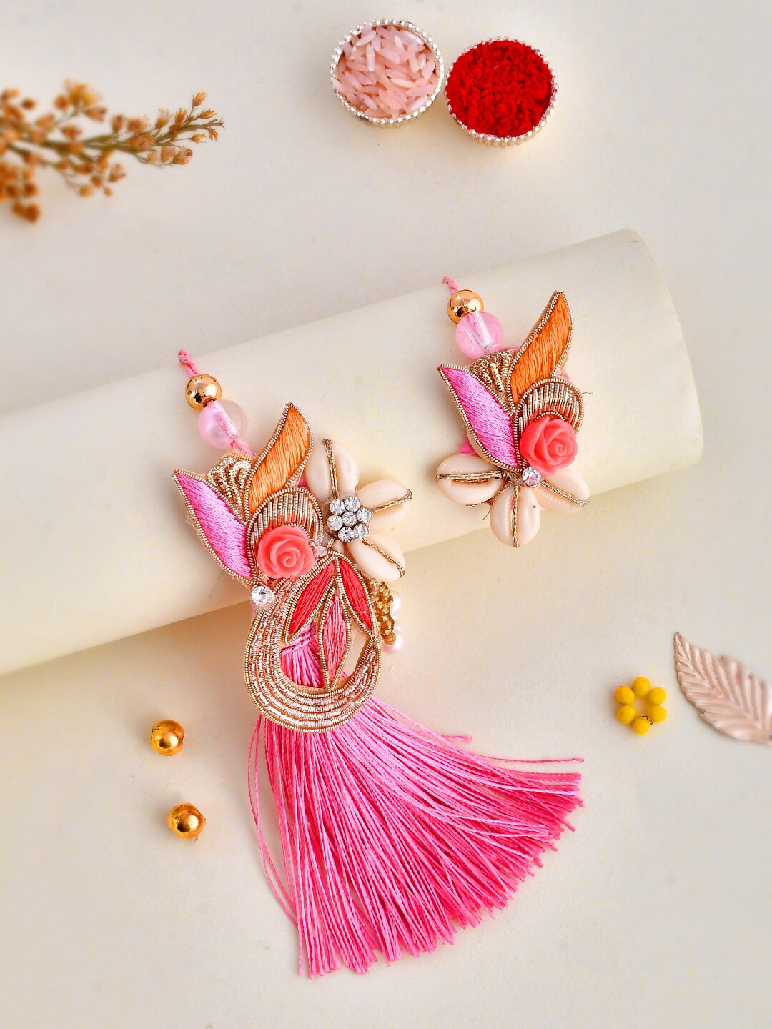 

Aapno Rajasthan Set Of 2 Shell & Zardosi Work Bhaiya Bhabhi Rakhi Set, Pink