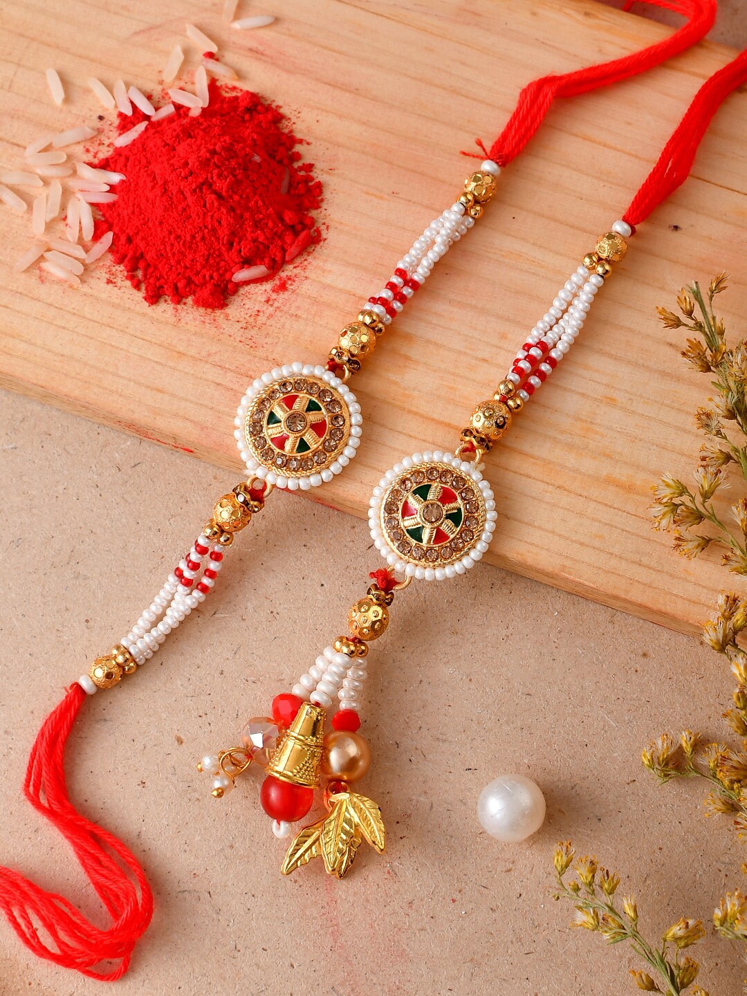 

Aapno Rajasthan Set of 2 Artificial Beads-Studded Rakhi with Roli Chawal & Greeting Card, Red