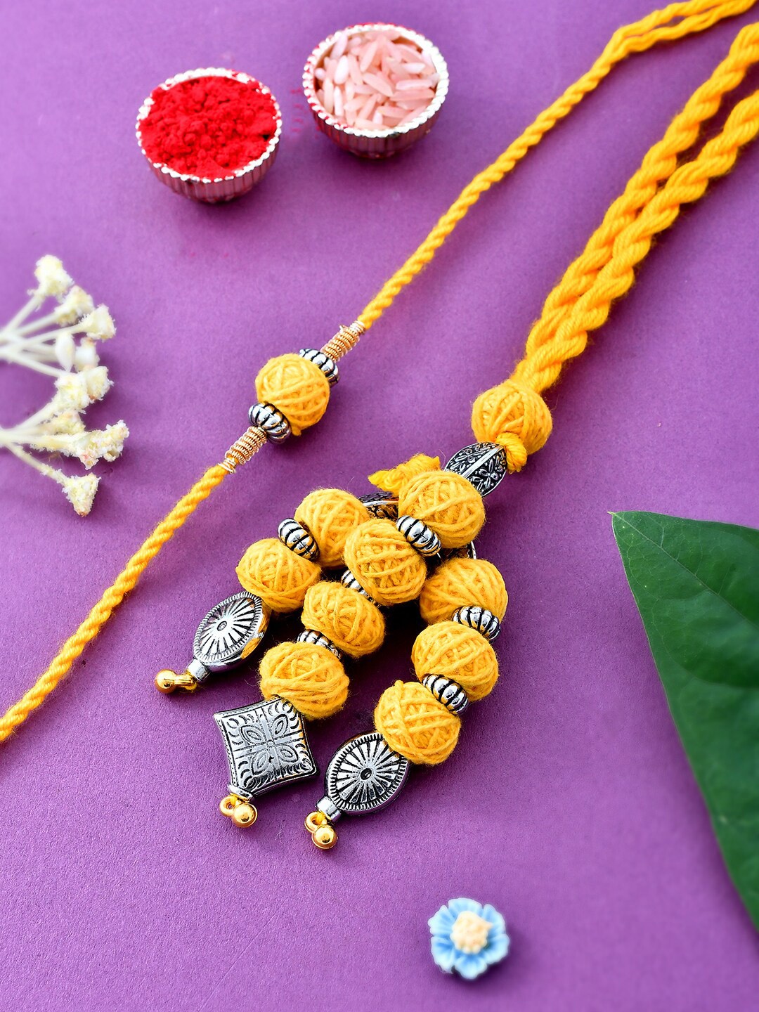 

Aapno Rajasthan Set of 2 Wool Knitted Bhai Bhabhi Rakhi, Yellow