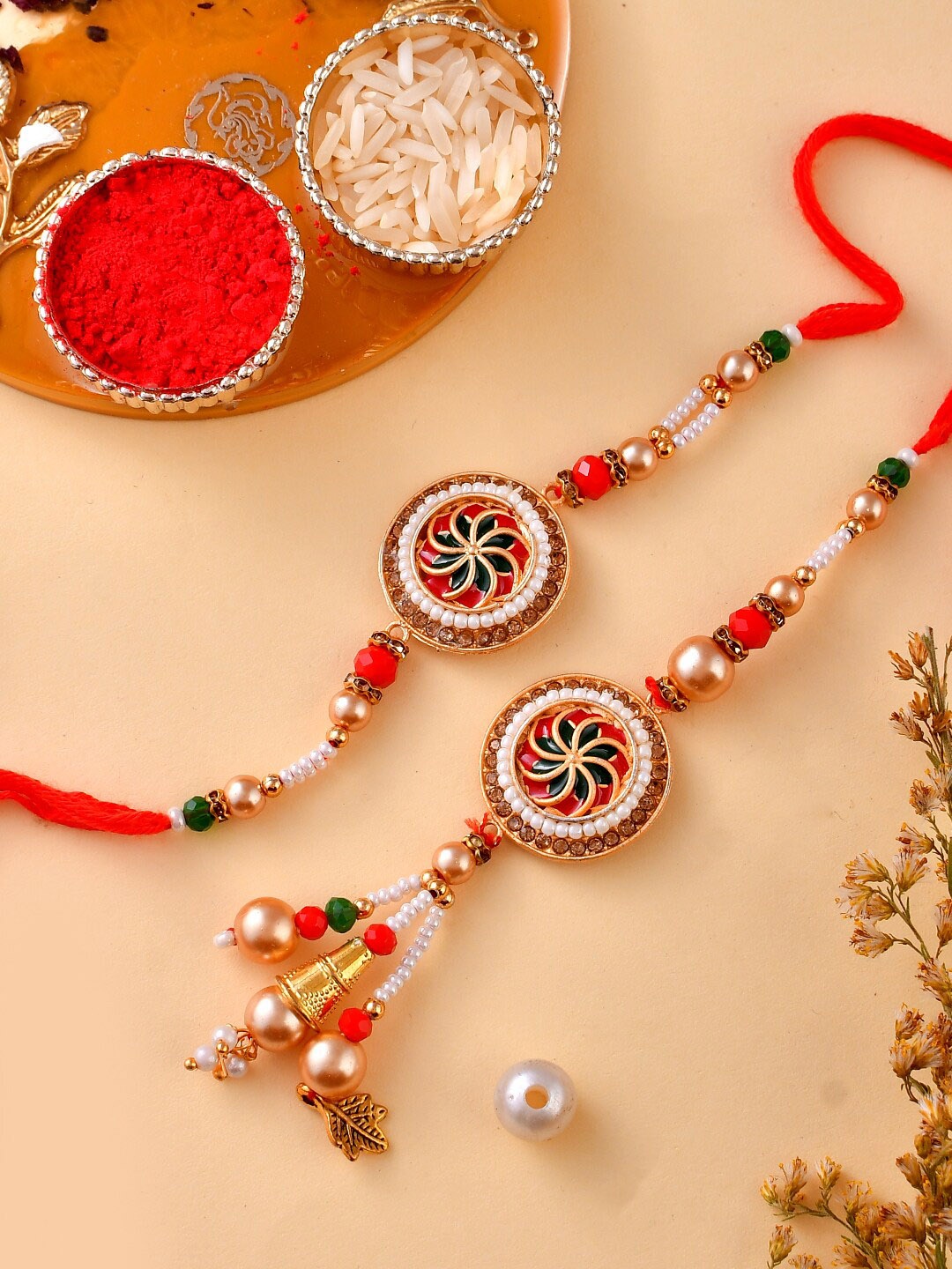 

Aapno Rajasthan Unisex Set Of 2 Beaded Rakhi Gift Set, Red